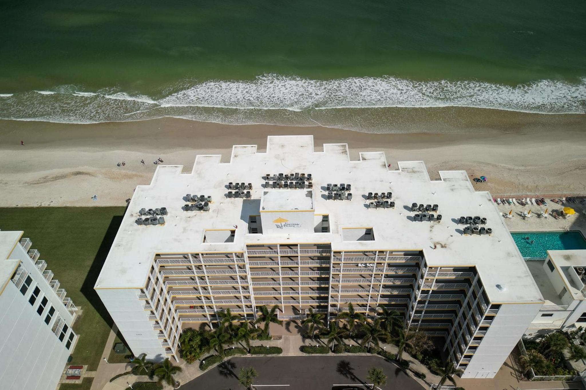 New listing! Direct oceanfront condo with a balcony, heated pool, and tennis court