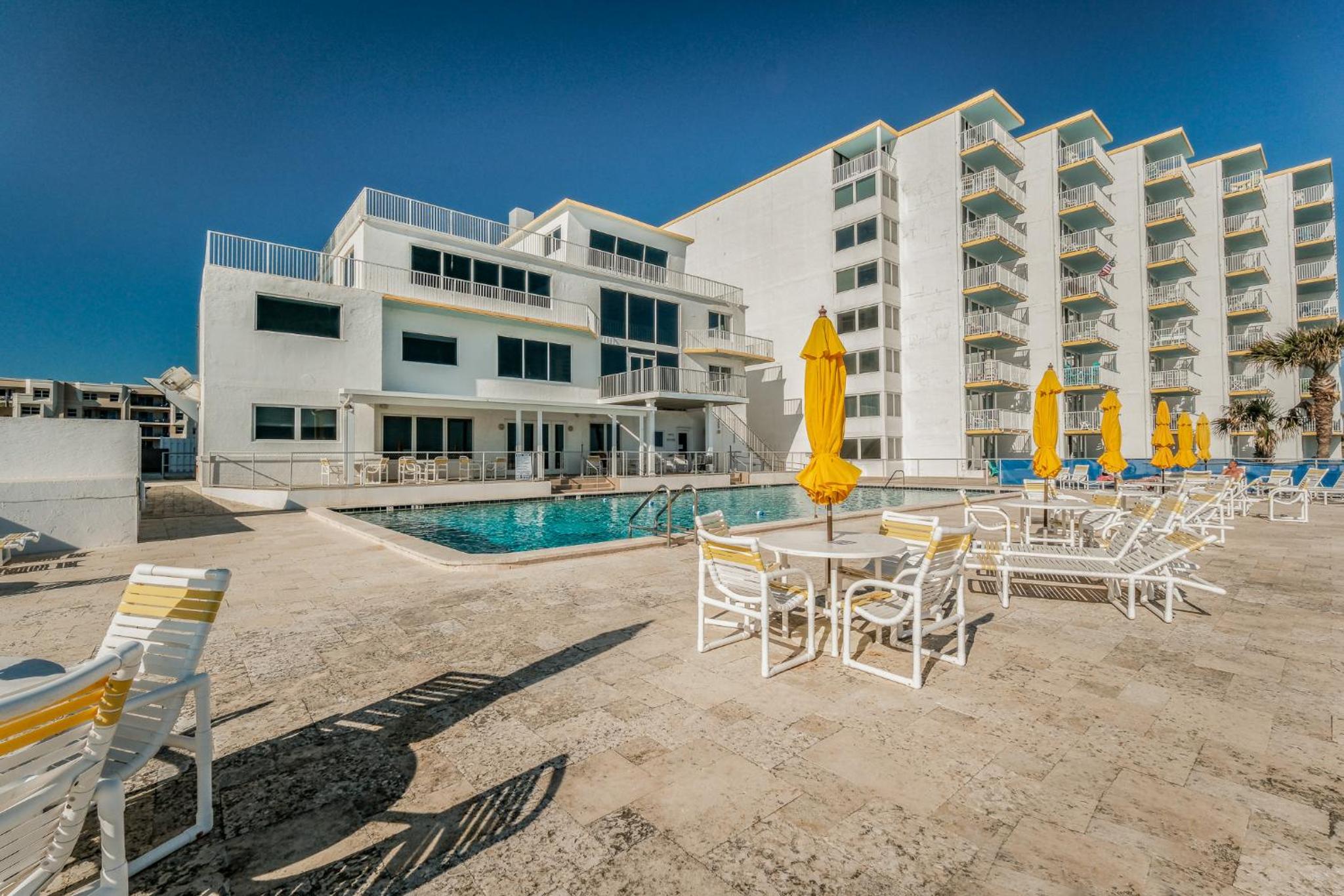 New listing! Direct oceanfront condo with a balcony, heated pool, and tennis court