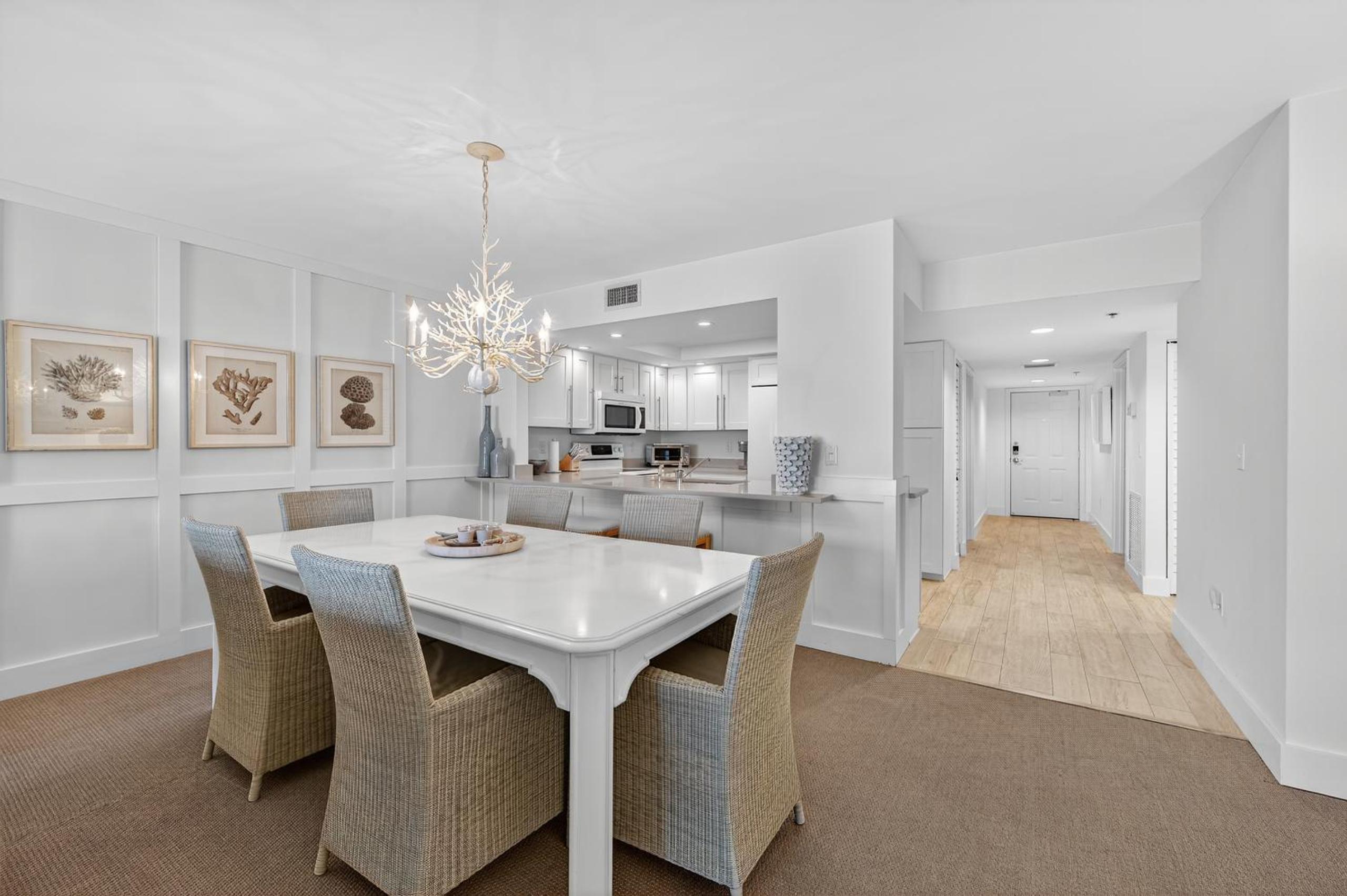 Ground floor direct oceanfront with a large patio, pool, and covered parking