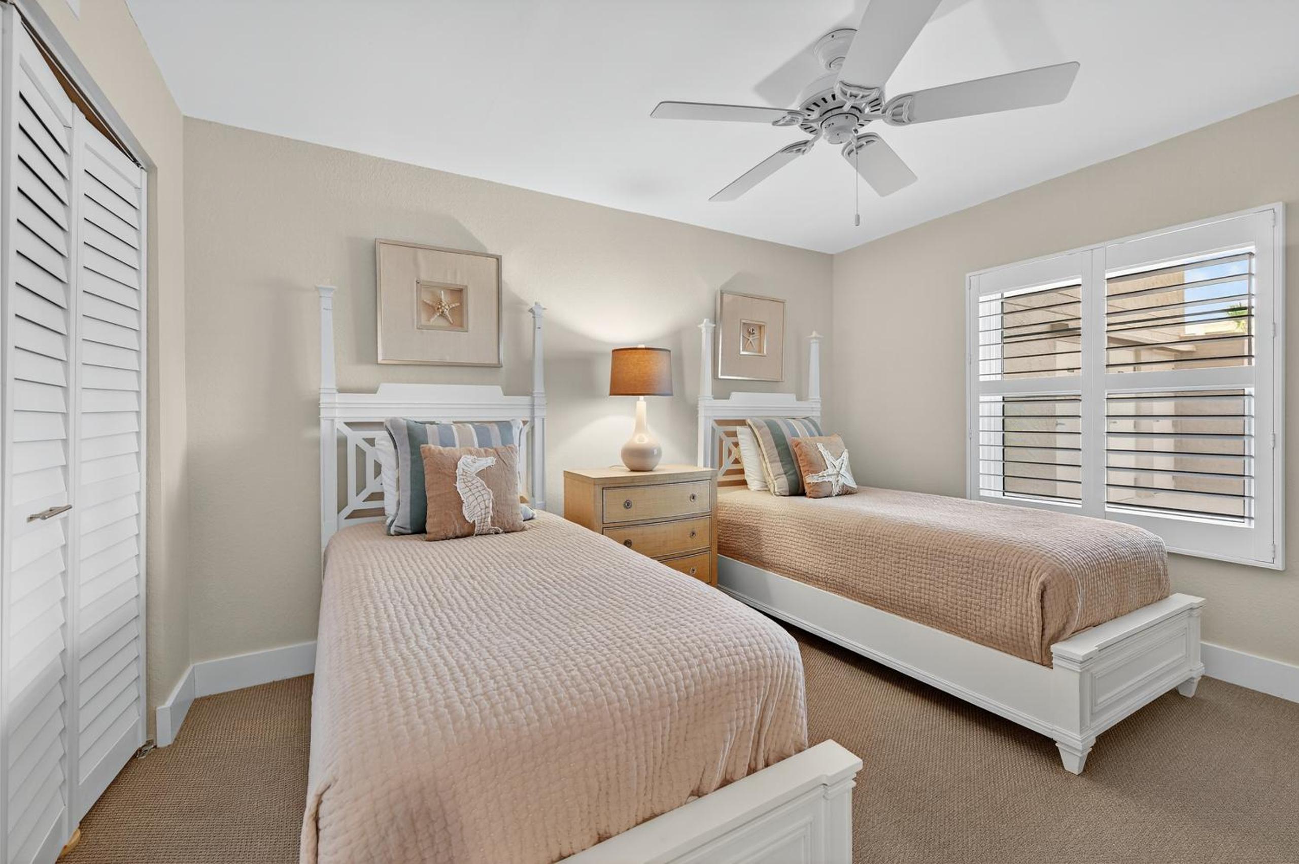 Ground floor direct oceanfront with a large patio, pool, and covered parking