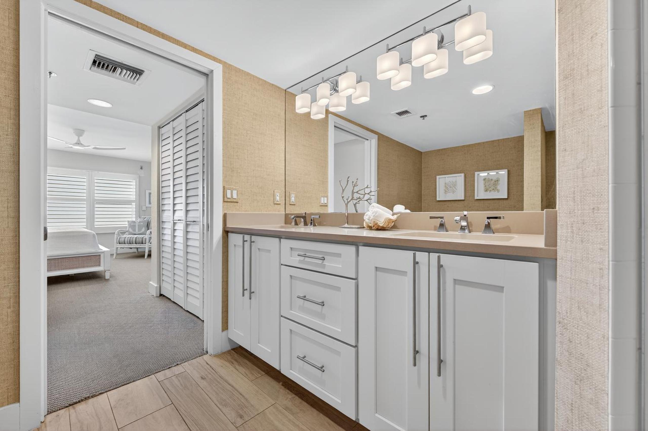 Ground floor direct oceanfront with a large patio, pool, and covered parking
