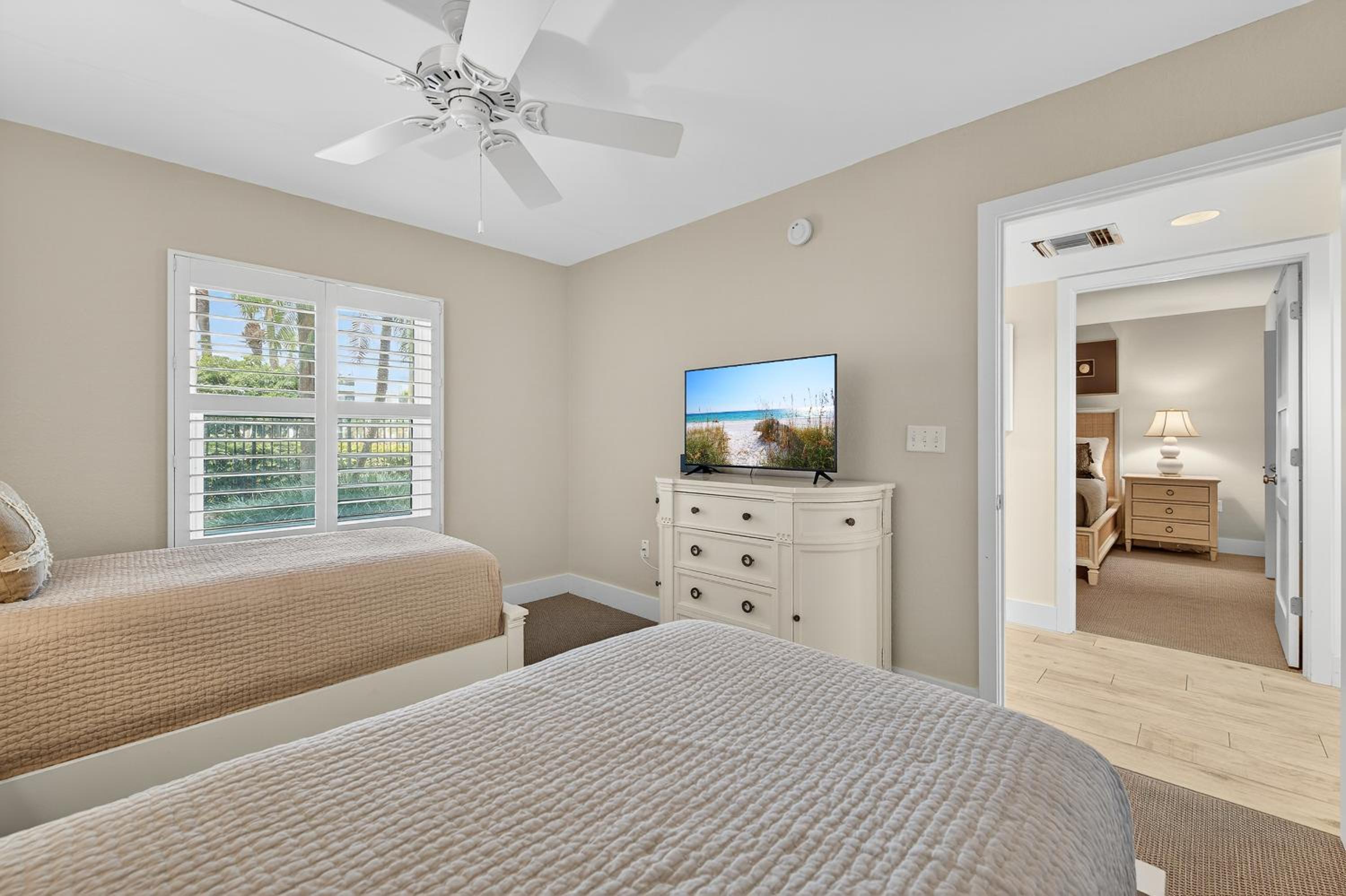 Ground floor direct oceanfront with a large patio, pool, and covered parking