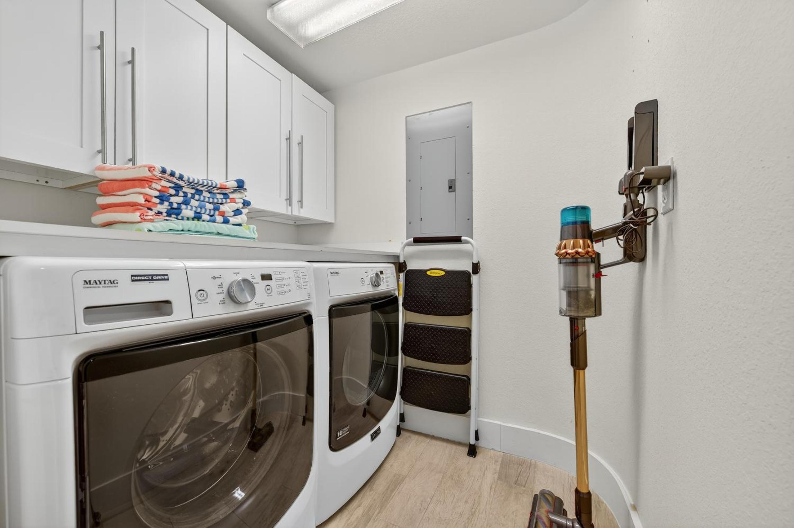 Ground floor direct oceanfront with a large patio, pool, and covered parking