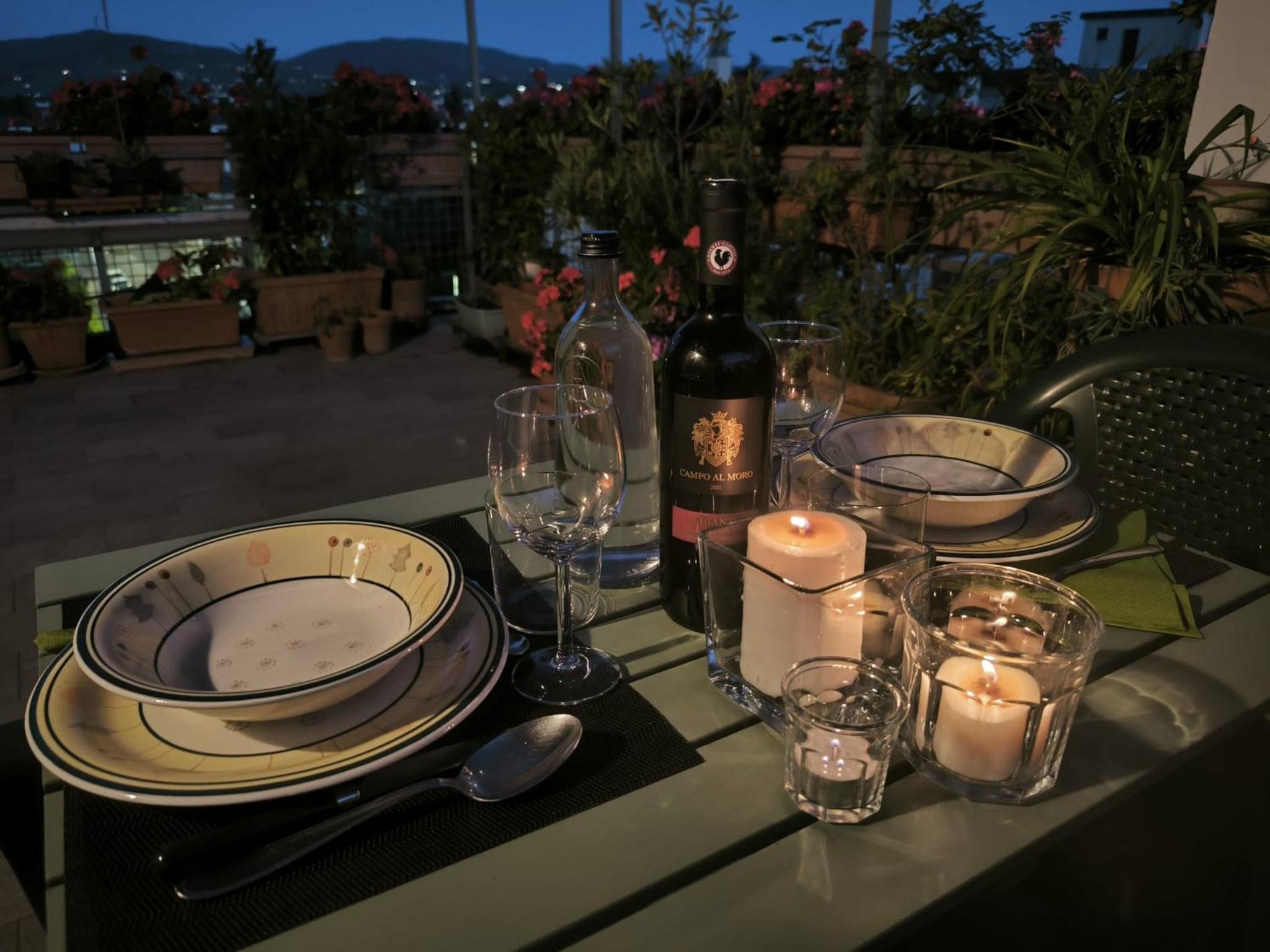 Una Terrazza tra Fiori e Cielo