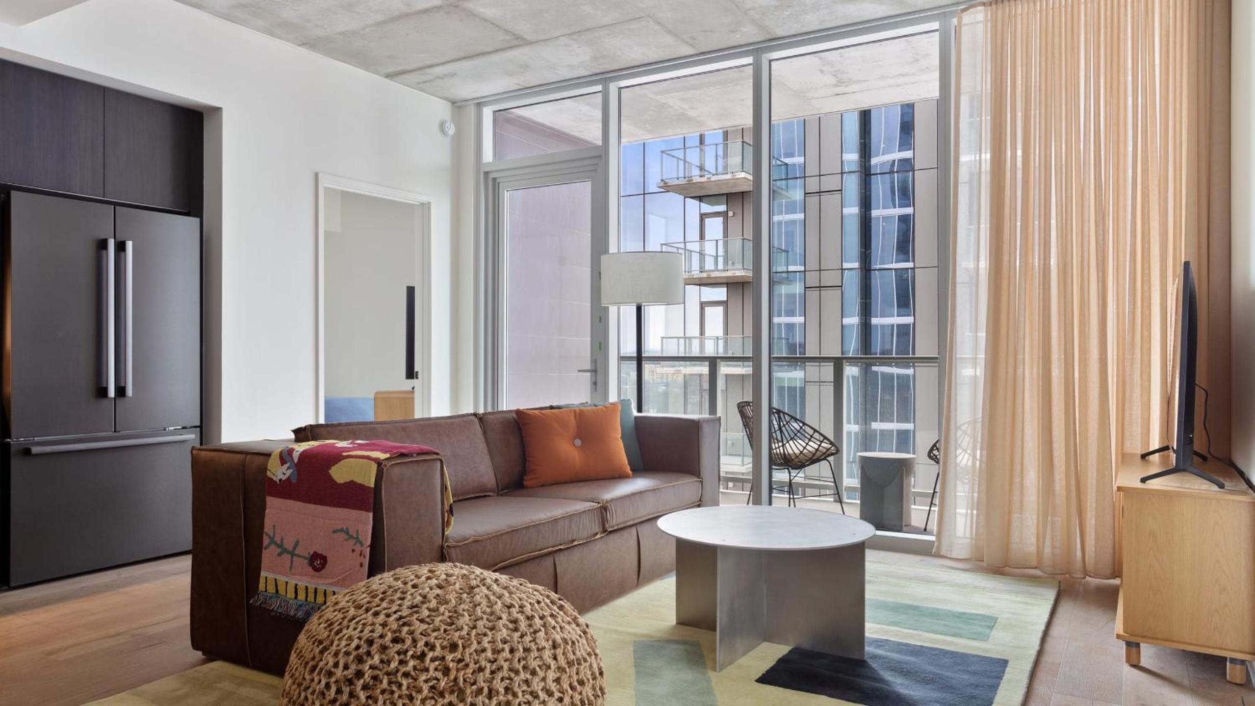 2 Luxury Condos 1 Block from Rainey St New High Rise w Rooftop Pool Gym