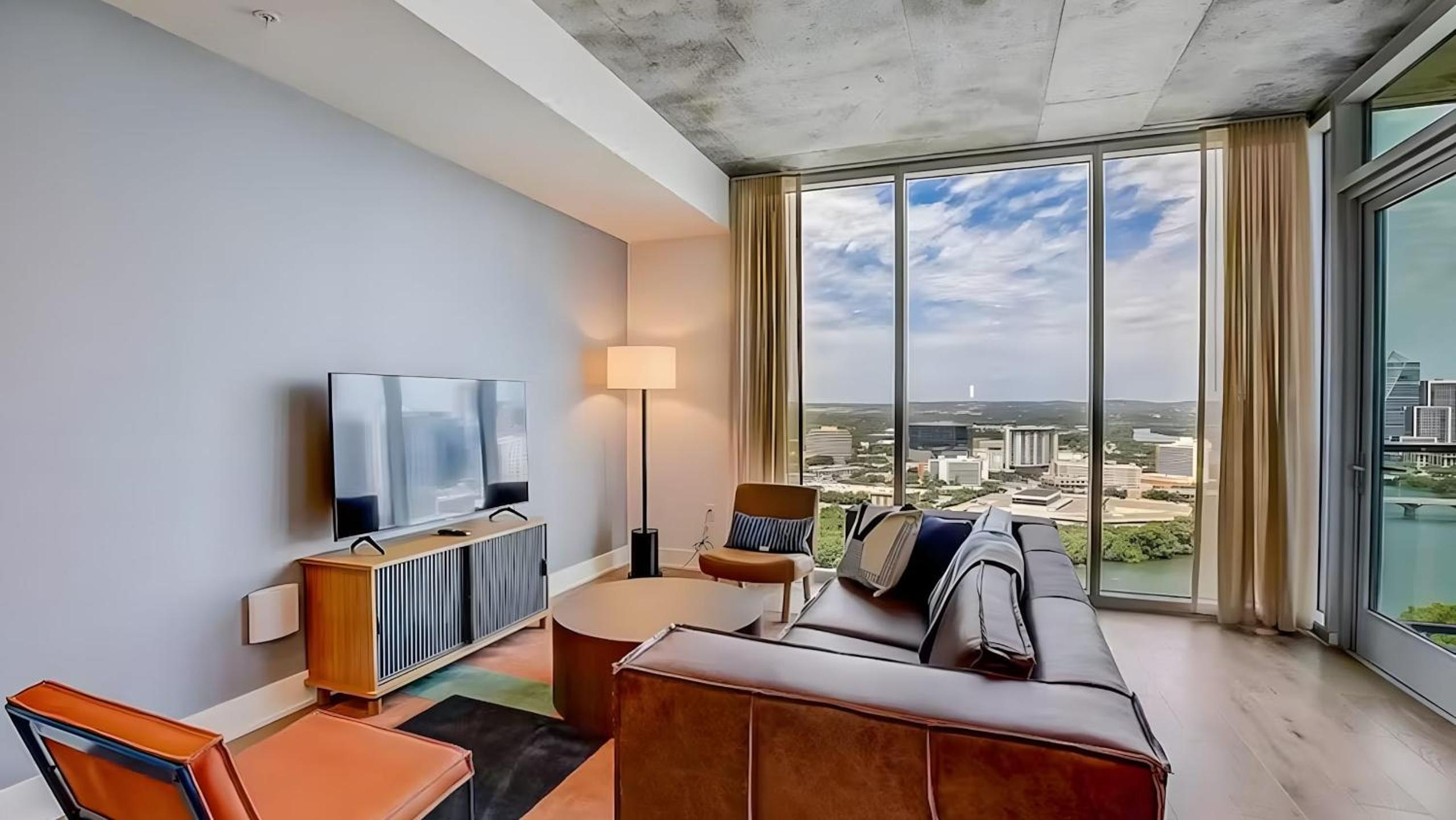 2 Luxury Condos 1 Block from Rainey St New High Rise w Rooftop Pool Gym