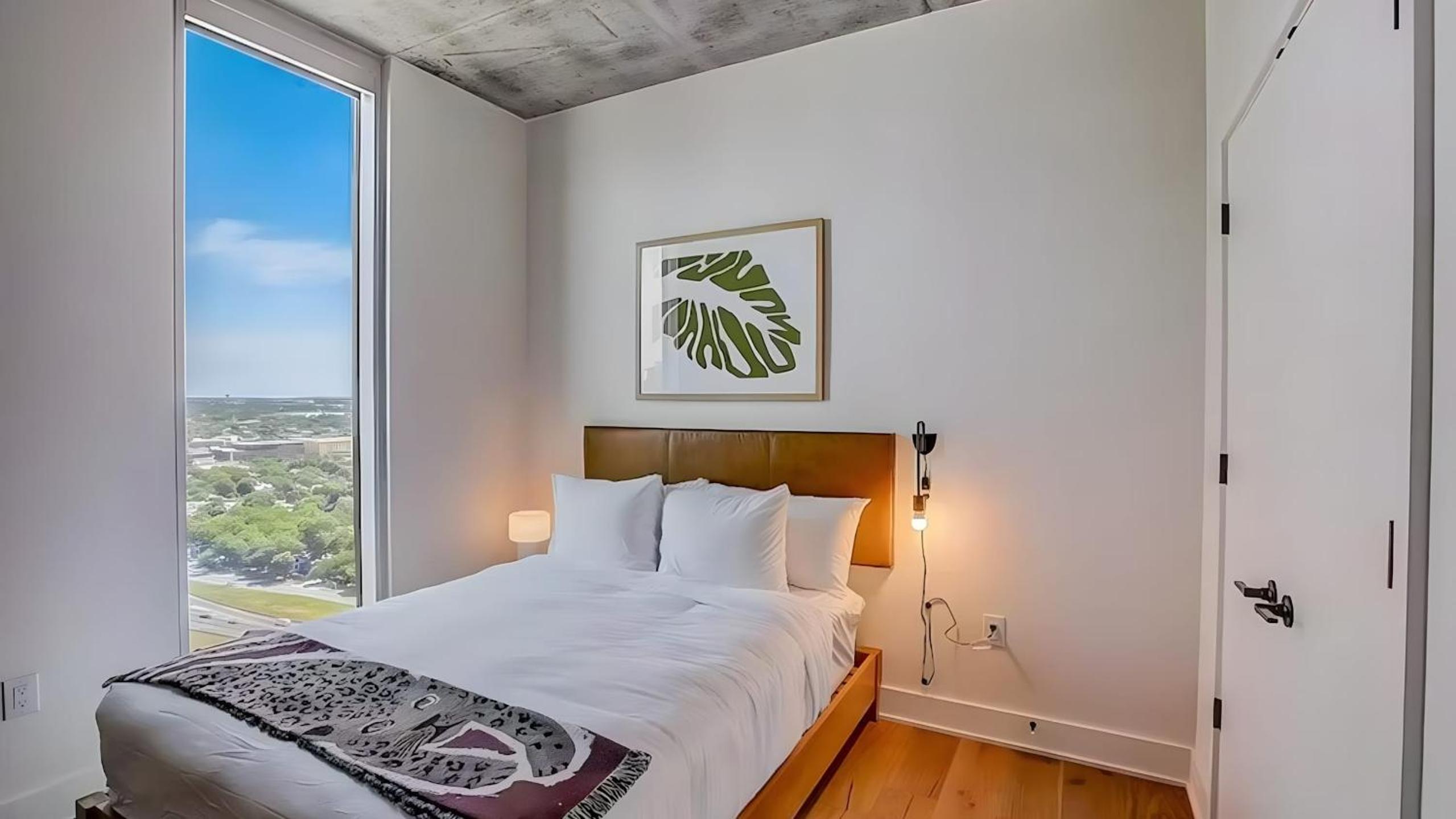 2 Luxury Condos 1 Block from Rainey St New High Rise w Rooftop Pool Gym