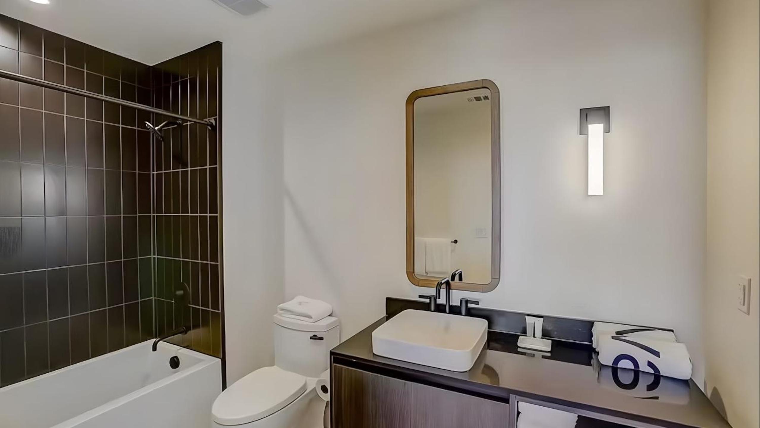 2 Luxury Condos 1 Block from Rainey St New High Rise w Rooftop Pool Gym