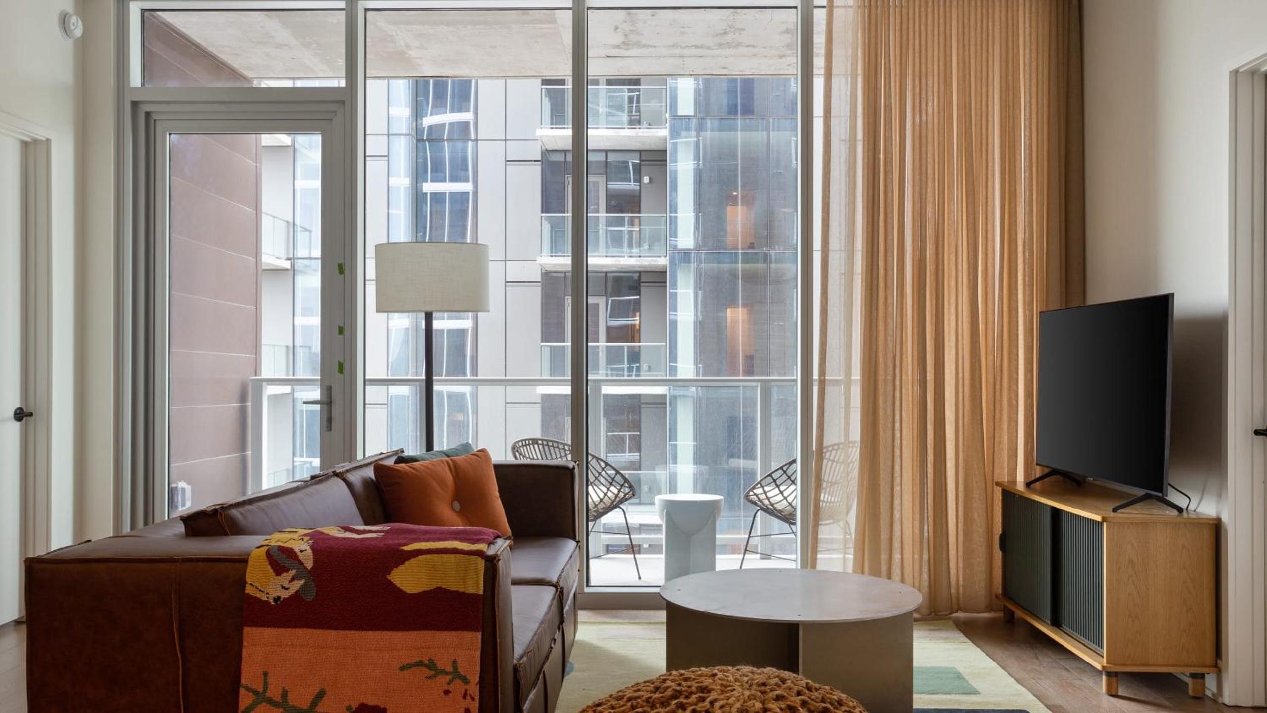 2 Luxury Condos 1 Block from Rainey St New High Rise w Rooftop Pool Gym