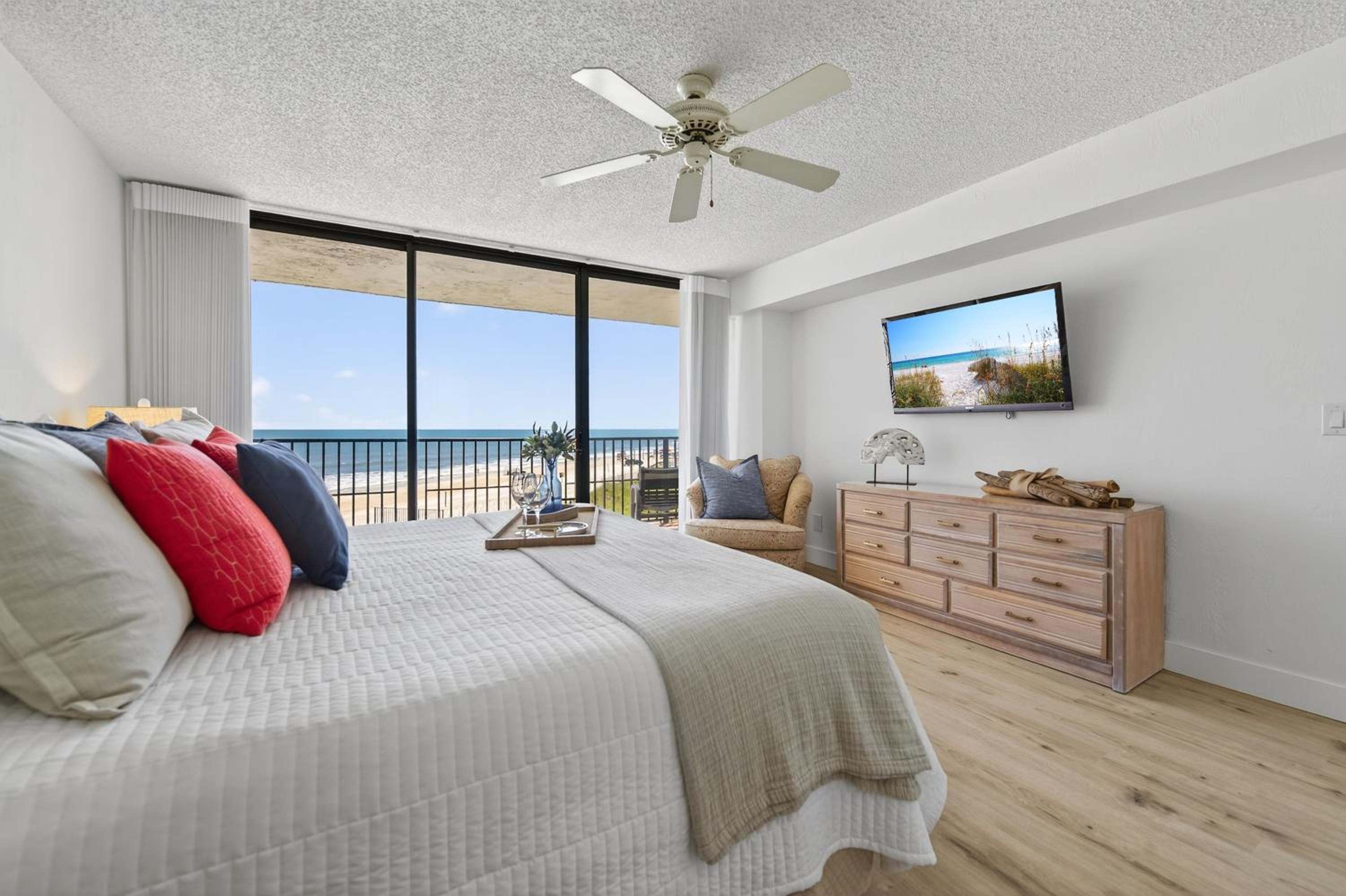 New Listing! Updated direct oceanfront condo with a pool, hot tub, and garage parking