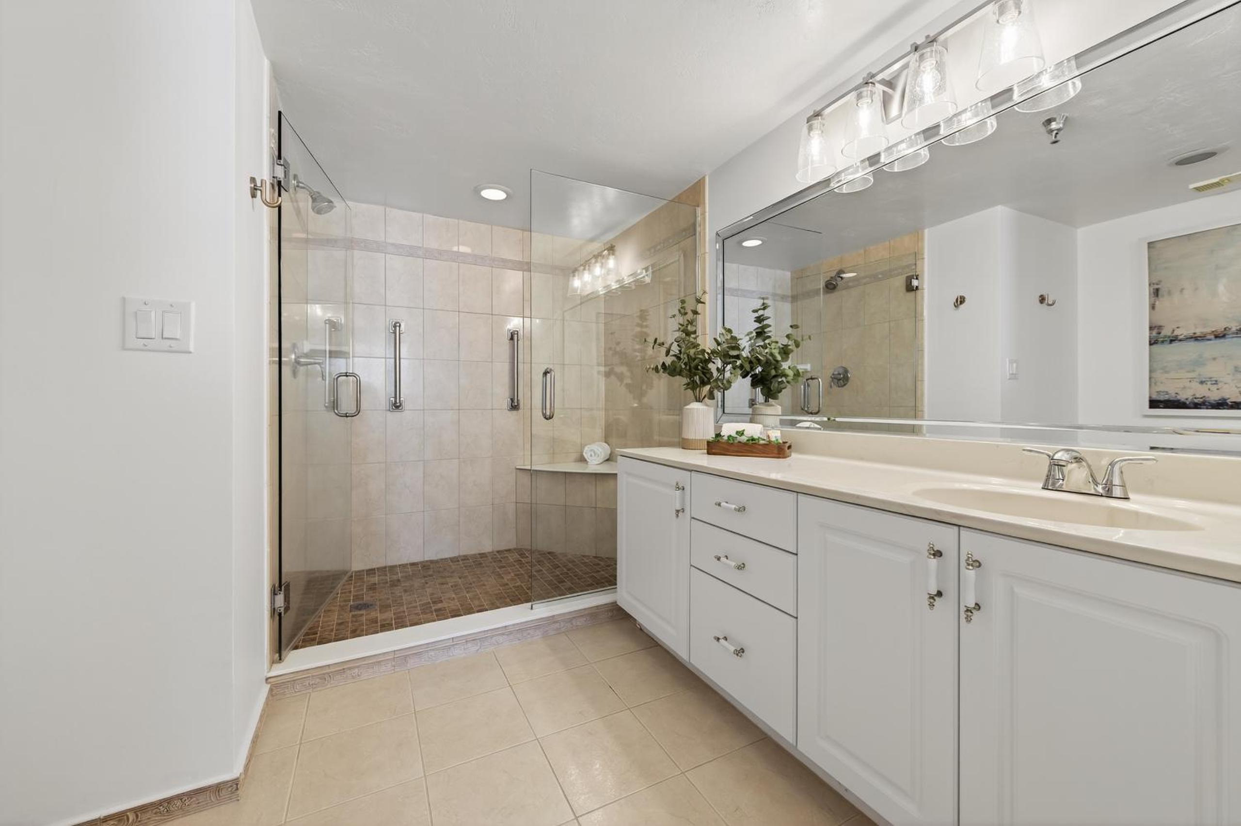 New Listing! Updated direct oceanfront condo with a pool, hot tub, and garage parking