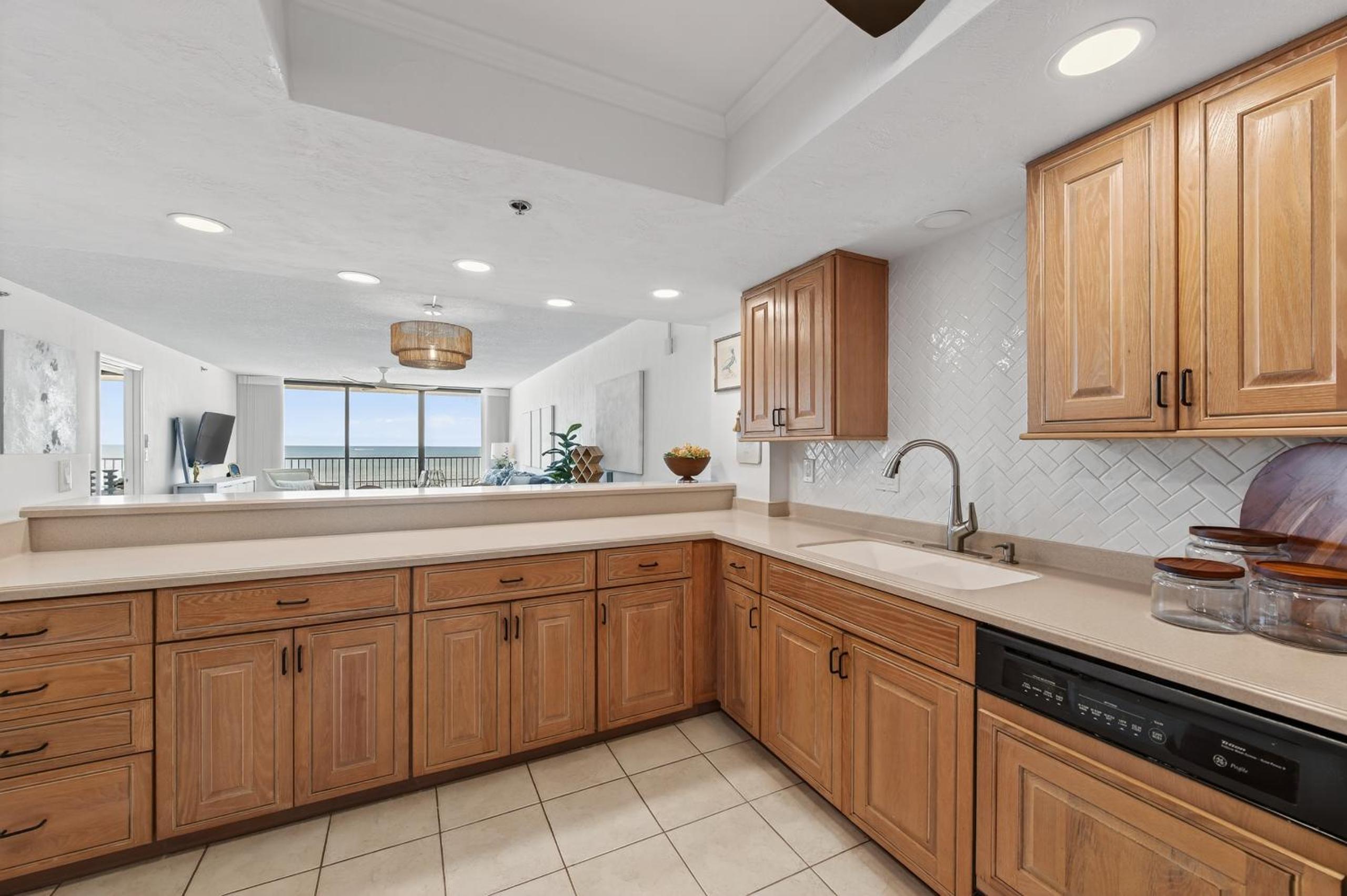 New Listing! Updated direct oceanfront condo with a pool, hot tub, and garage parking