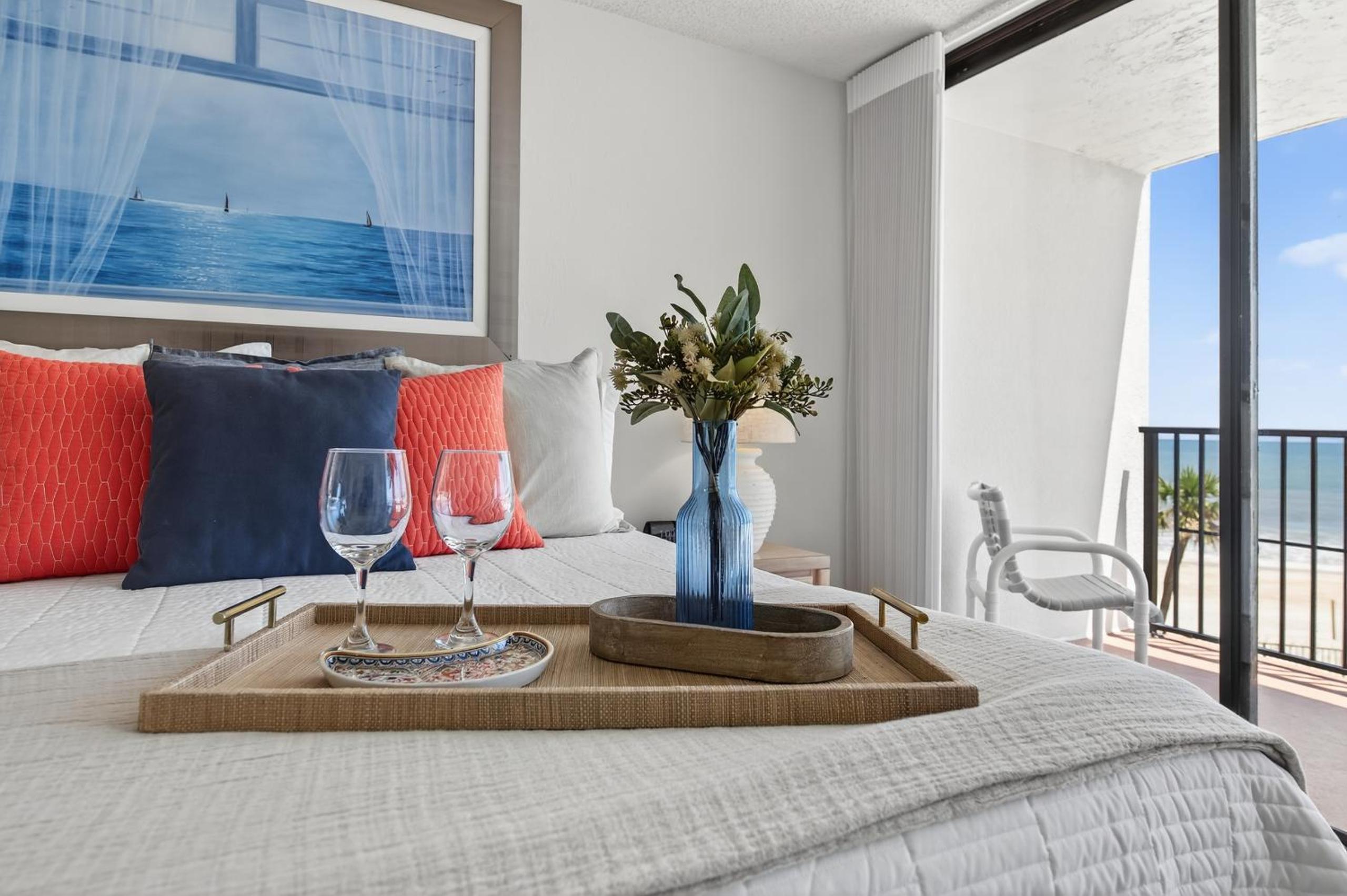 New Listing! Updated direct oceanfront condo with a pool, hot tub, and garage parking