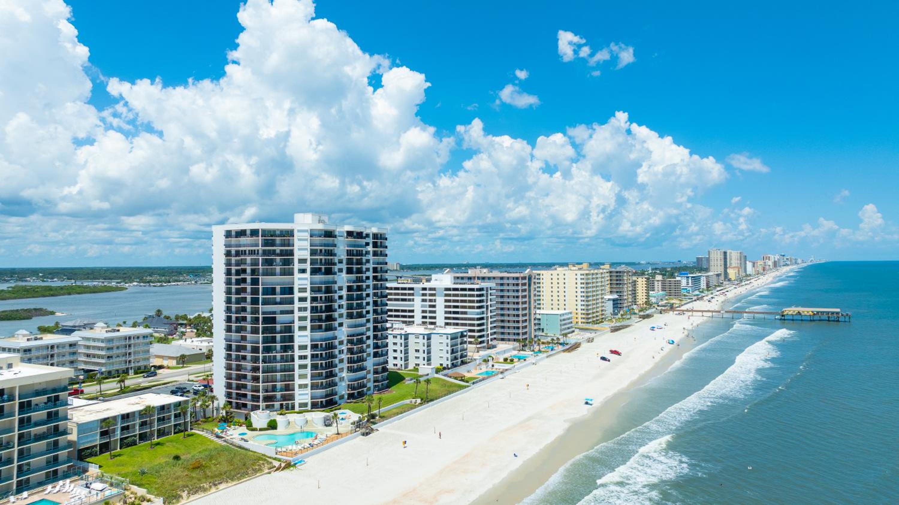 New Listing! Updated direct oceanfront condo with a pool, hot tub, and garage parking