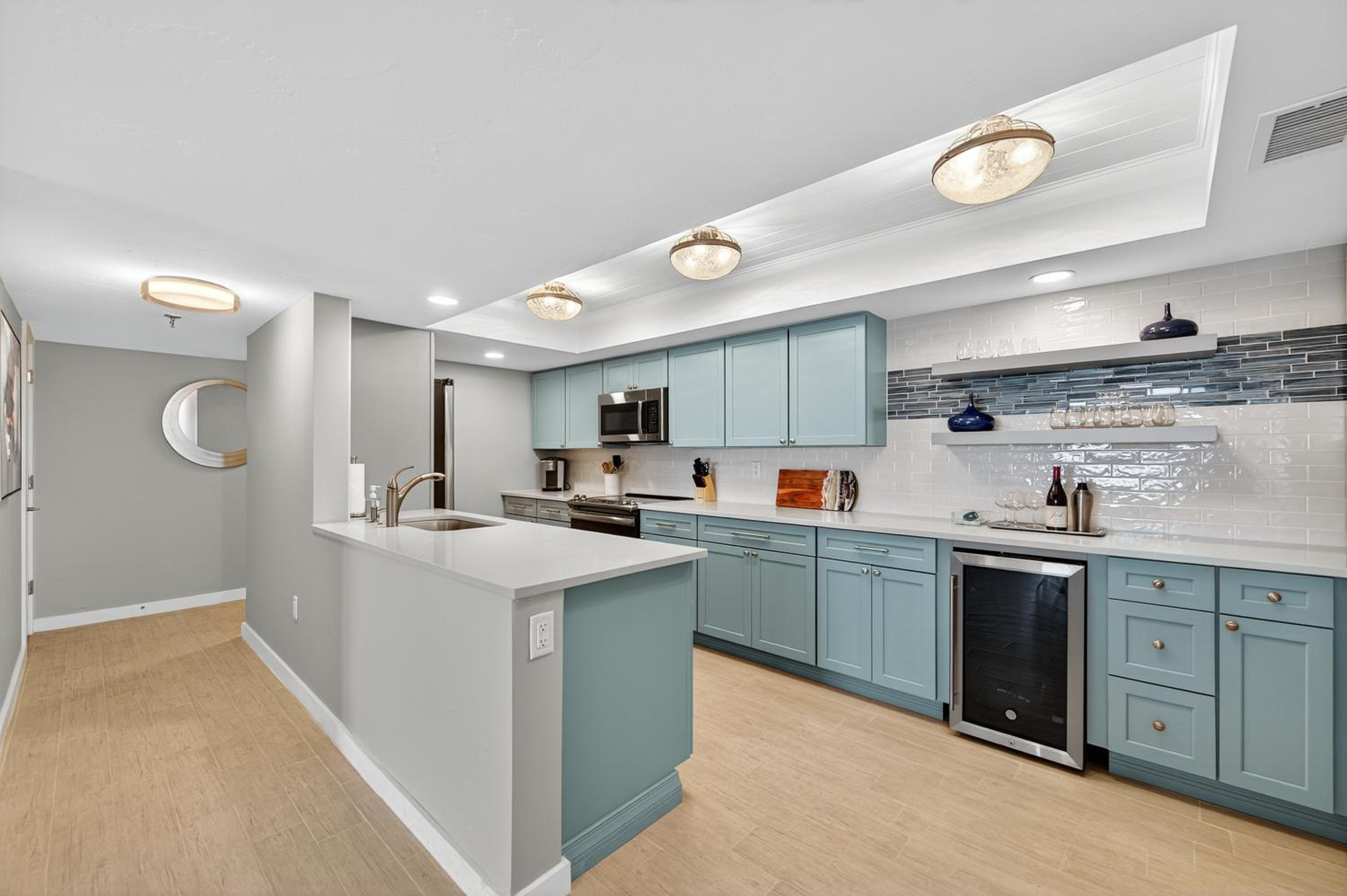 Renovated direct oceanfront condo with spacious balcony, heated pool, and garage parking