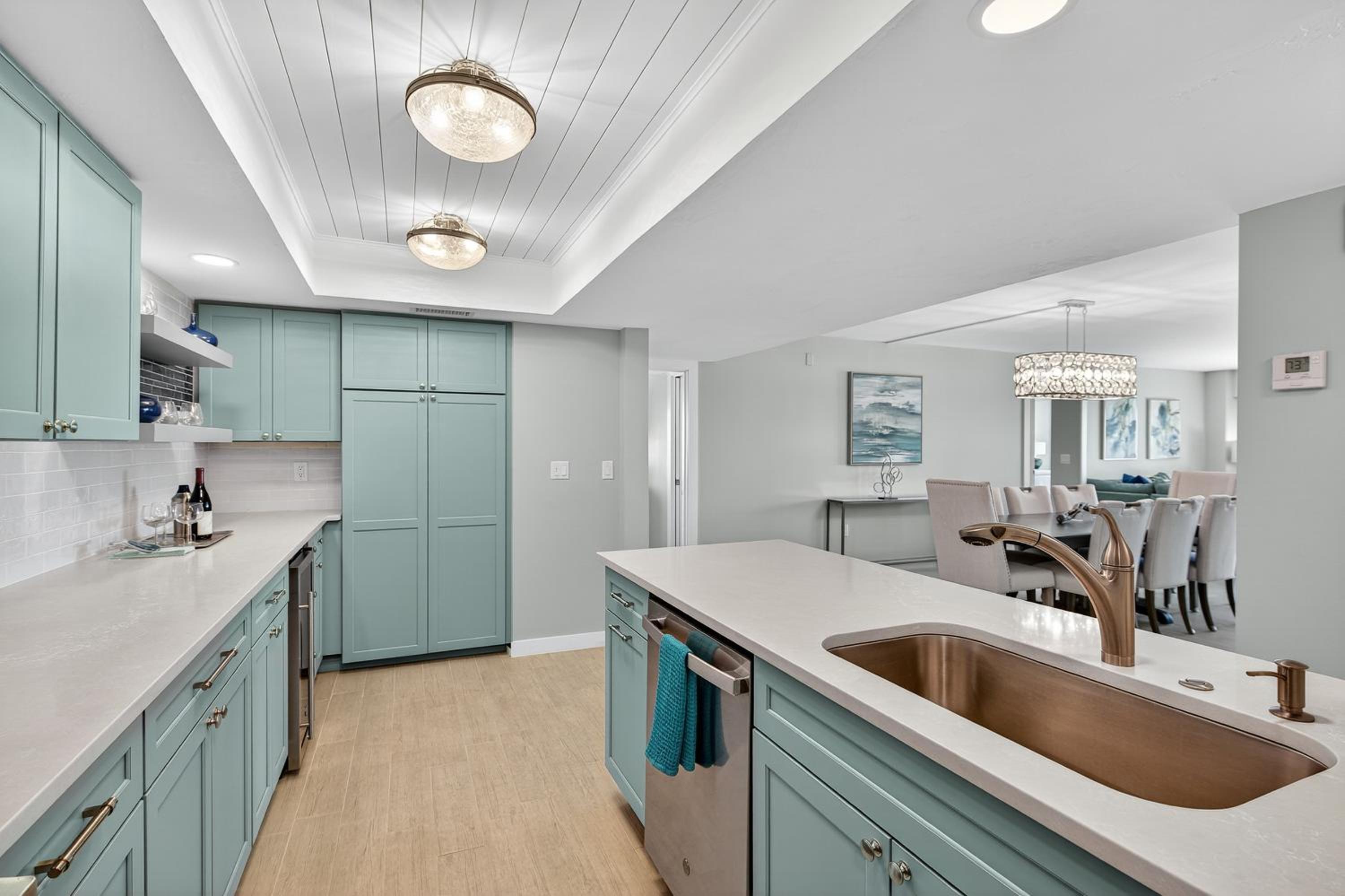 Renovated direct oceanfront condo with spacious balcony, heated pool, and garage parking