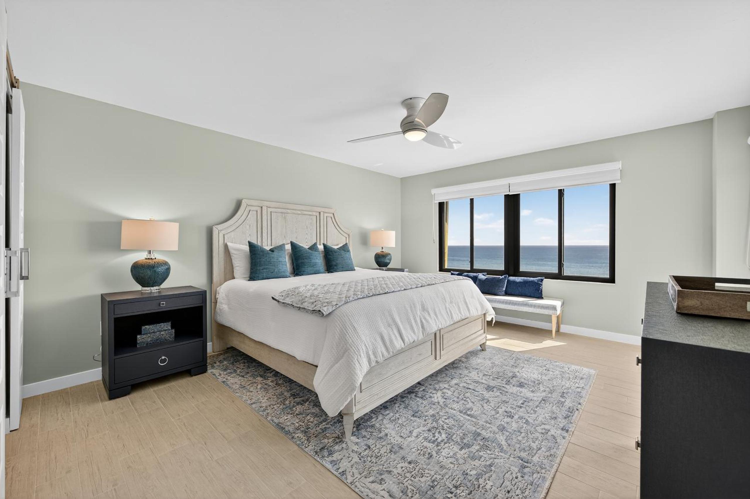 Renovated direct oceanfront condo with spacious balcony, heated pool, and garage parking