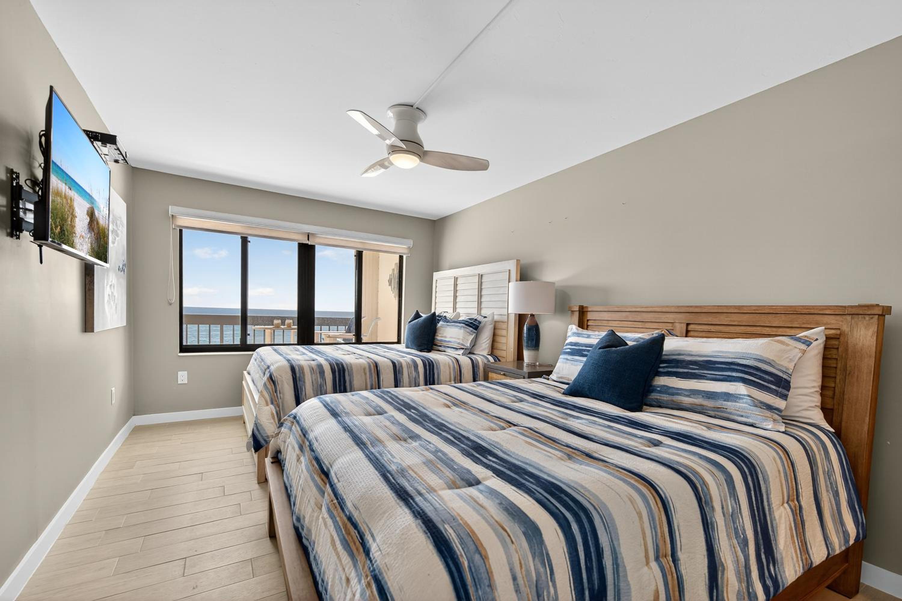 Renovated direct oceanfront condo with spacious balcony, heated pool, and garage parking