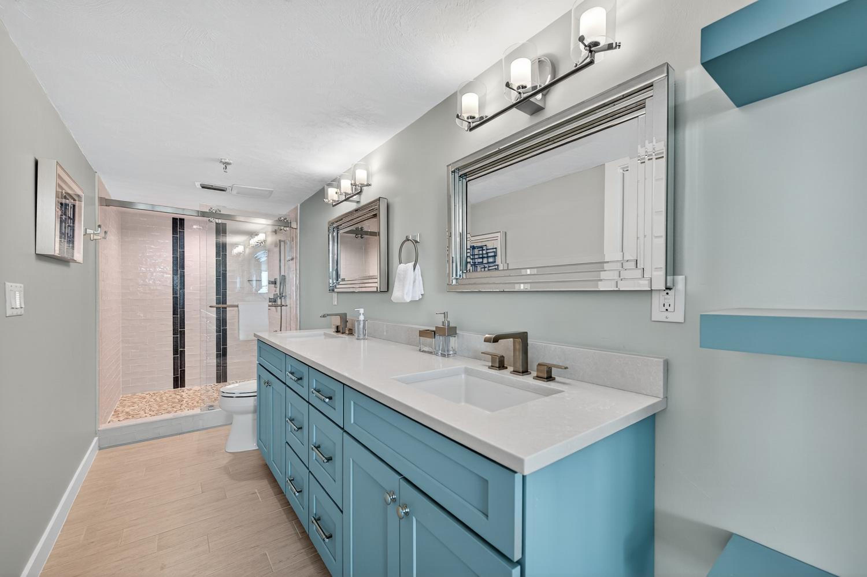 Renovated direct oceanfront condo with spacious balcony, heated pool, and garage parking