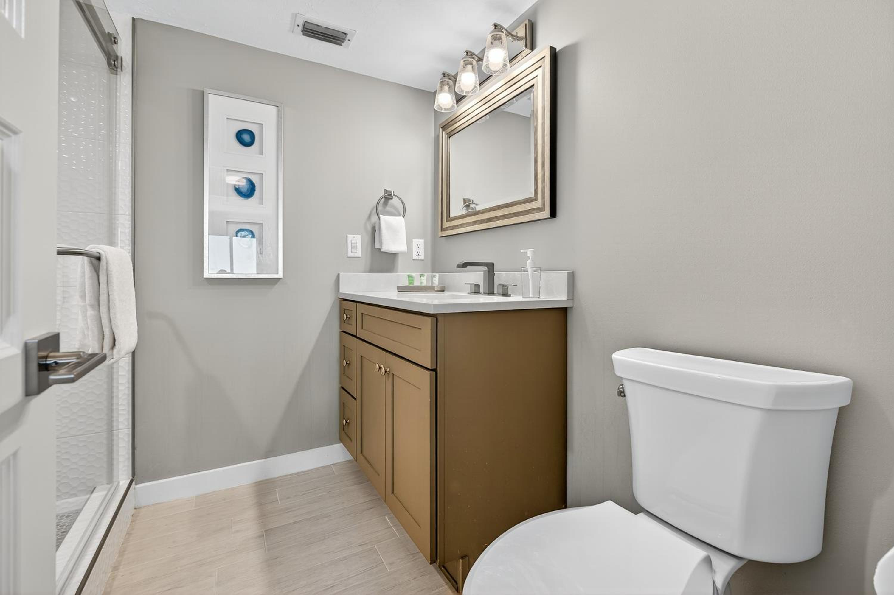 Renovated direct oceanfront condo with spacious balcony, heated pool, and garage parking
