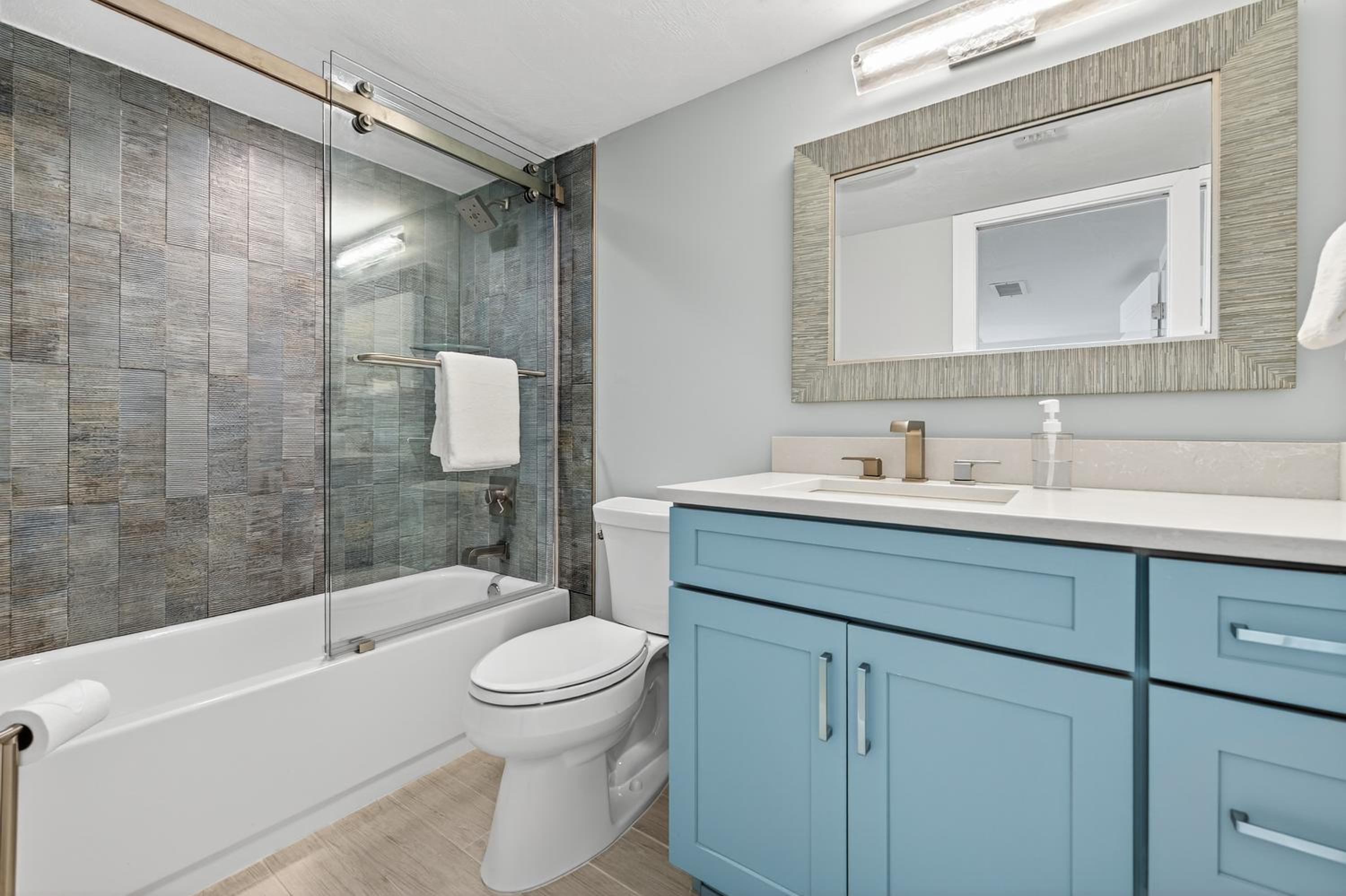 Renovated direct oceanfront condo with spacious balcony, heated pool, and garage parking