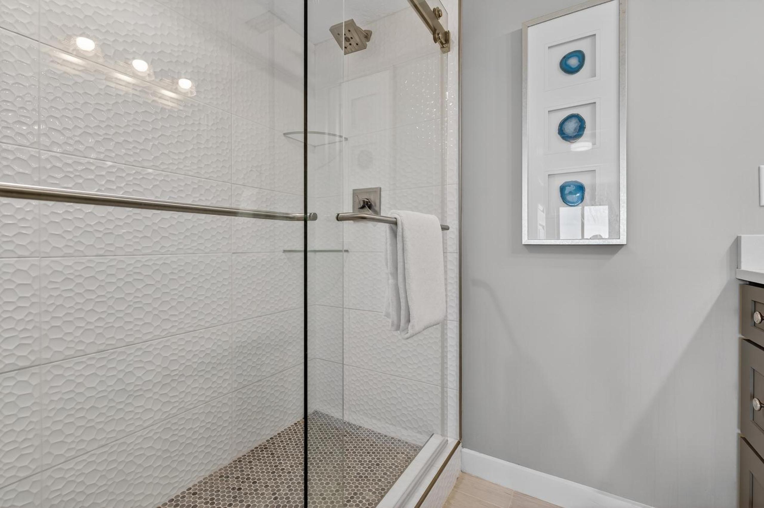 Renovated direct oceanfront condo with spacious balcony, heated pool, and garage parking