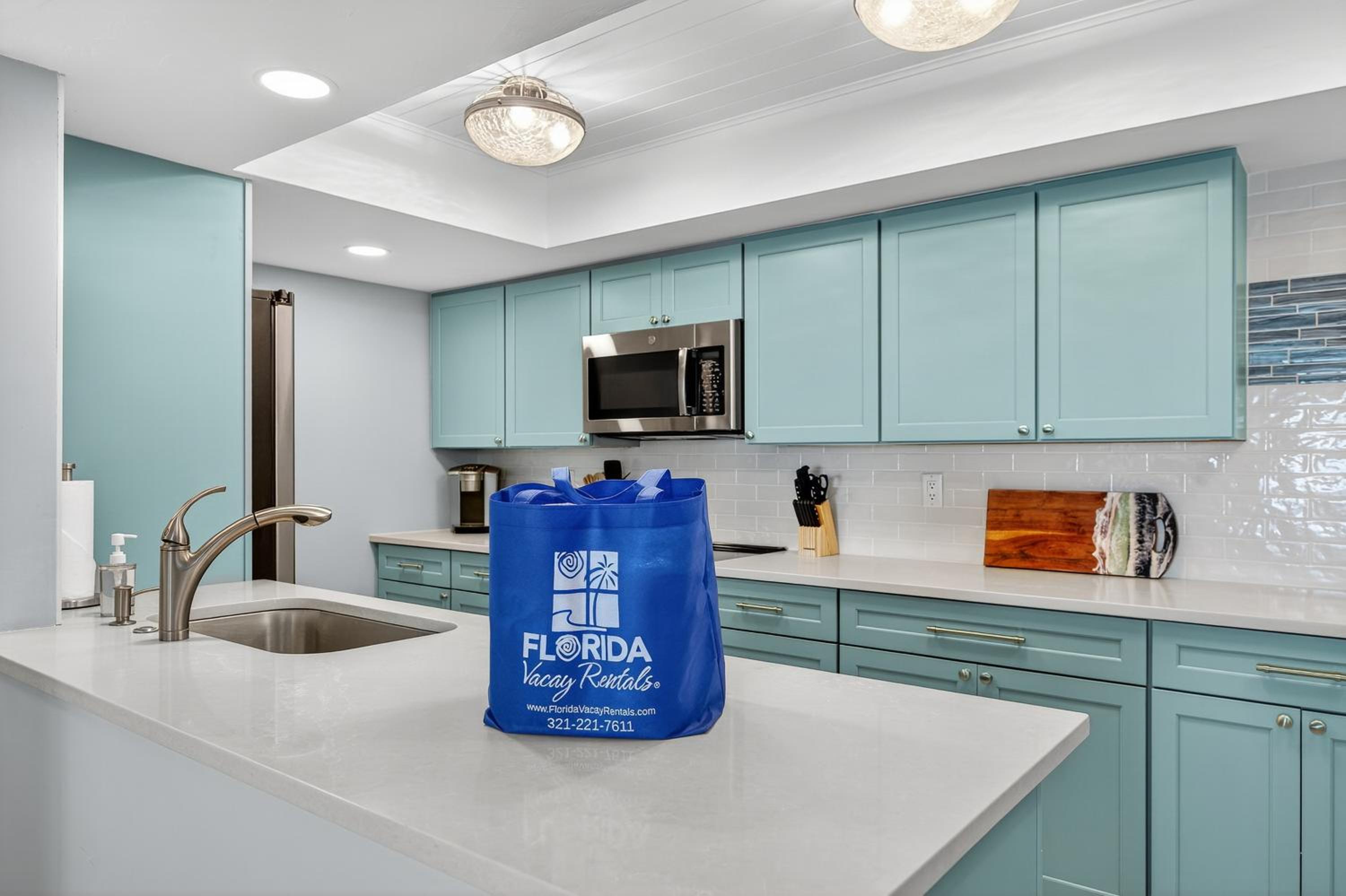 Renovated direct oceanfront condo with spacious balcony, heated pool, and garage parking