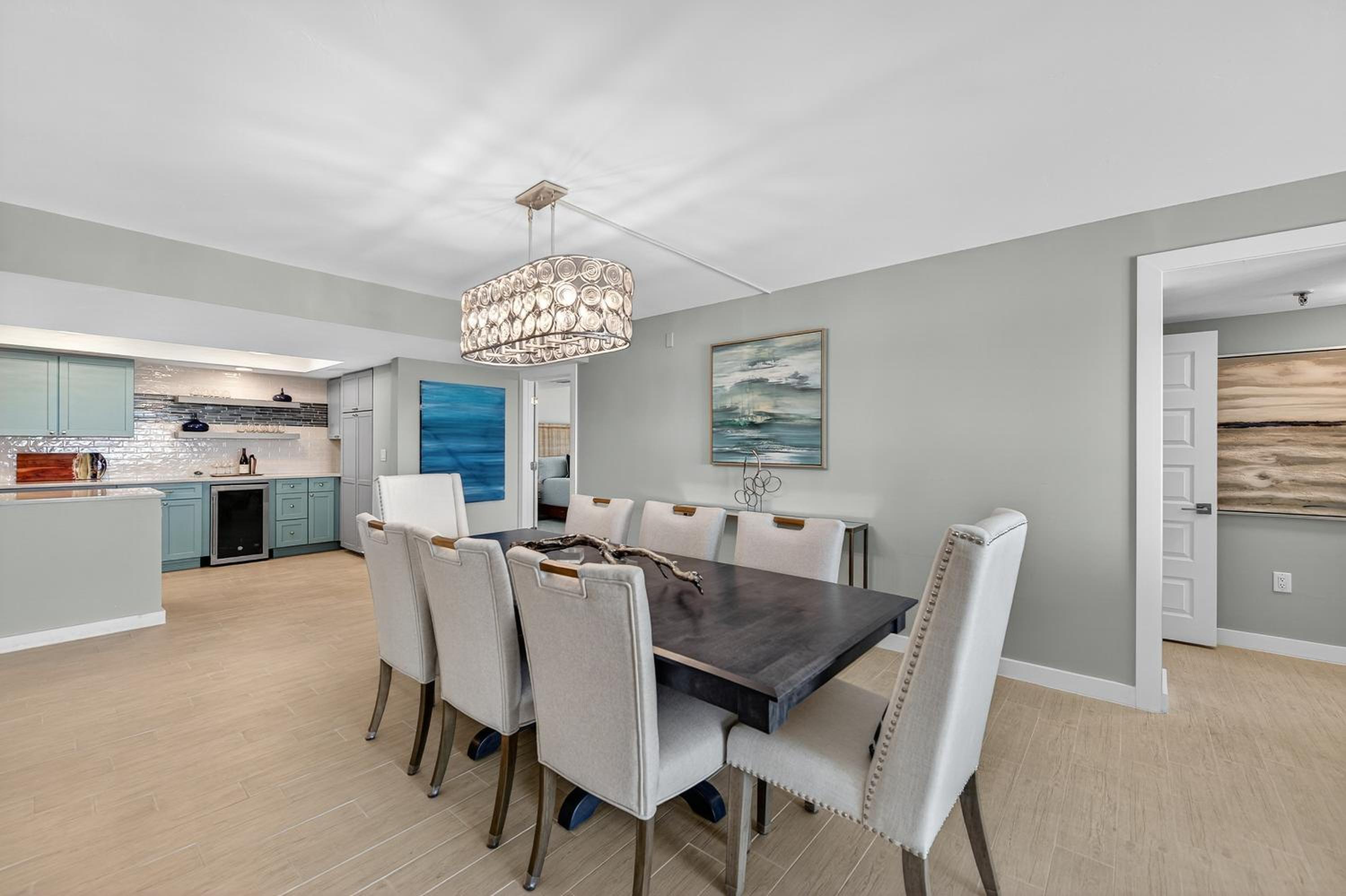 Renovated direct oceanfront condo with spacious balcony, heated pool, and garage parking