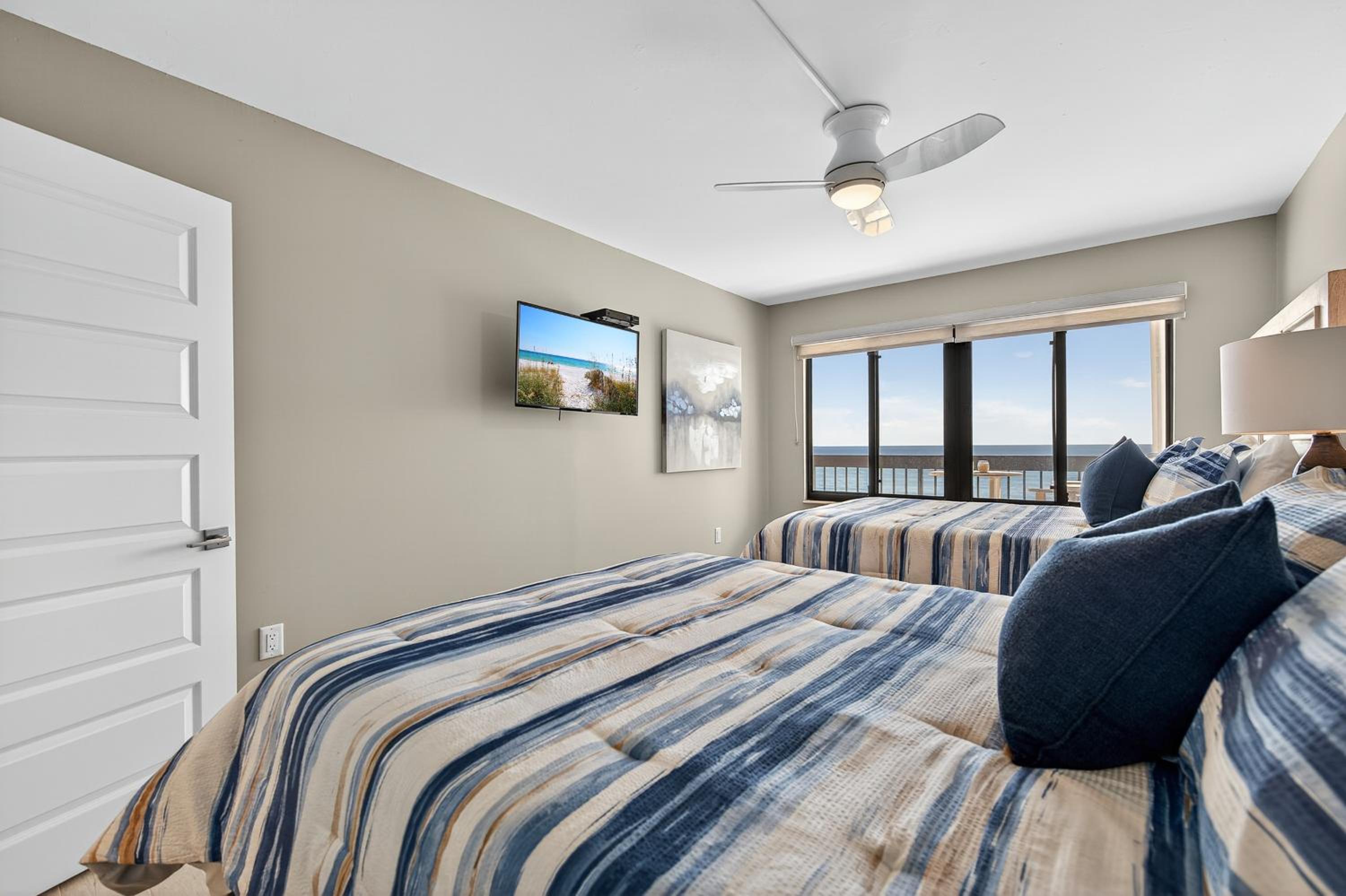 Renovated direct oceanfront condo with spacious balcony, heated pool, and garage parking