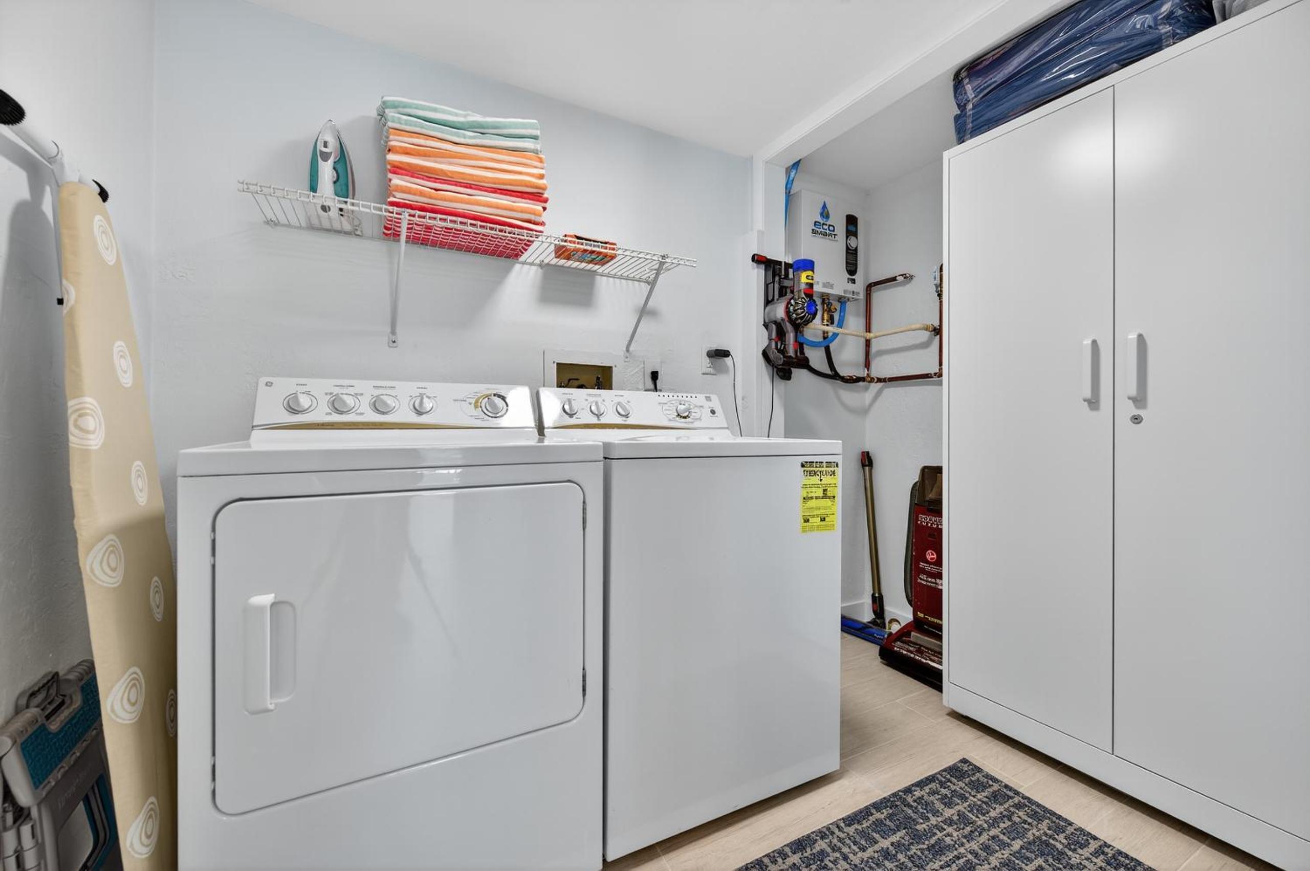 Renovated direct oceanfront condo with spacious balcony, heated pool, and garage parking