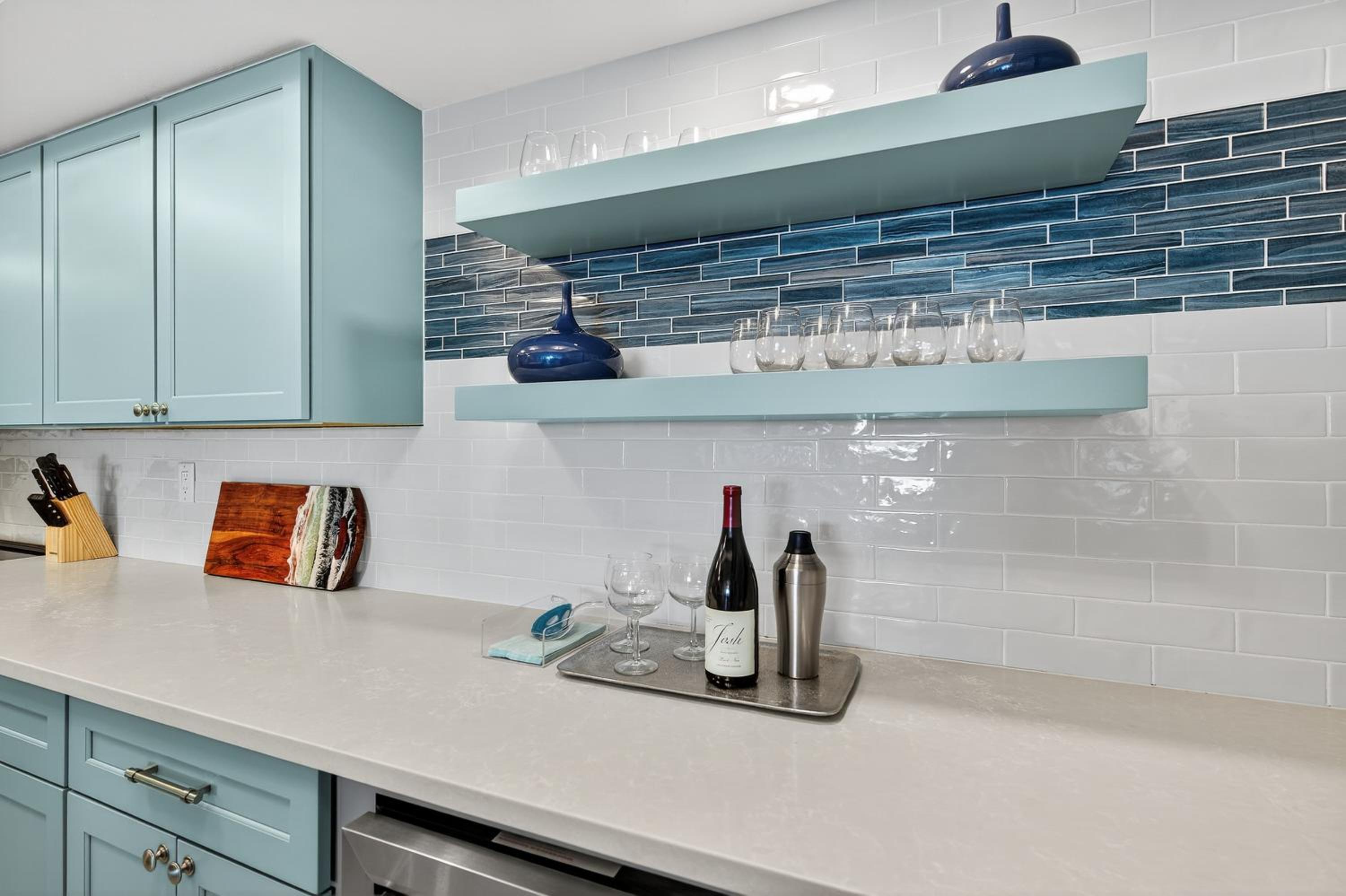 Renovated direct oceanfront condo with spacious balcony, heated pool, and garage parking
