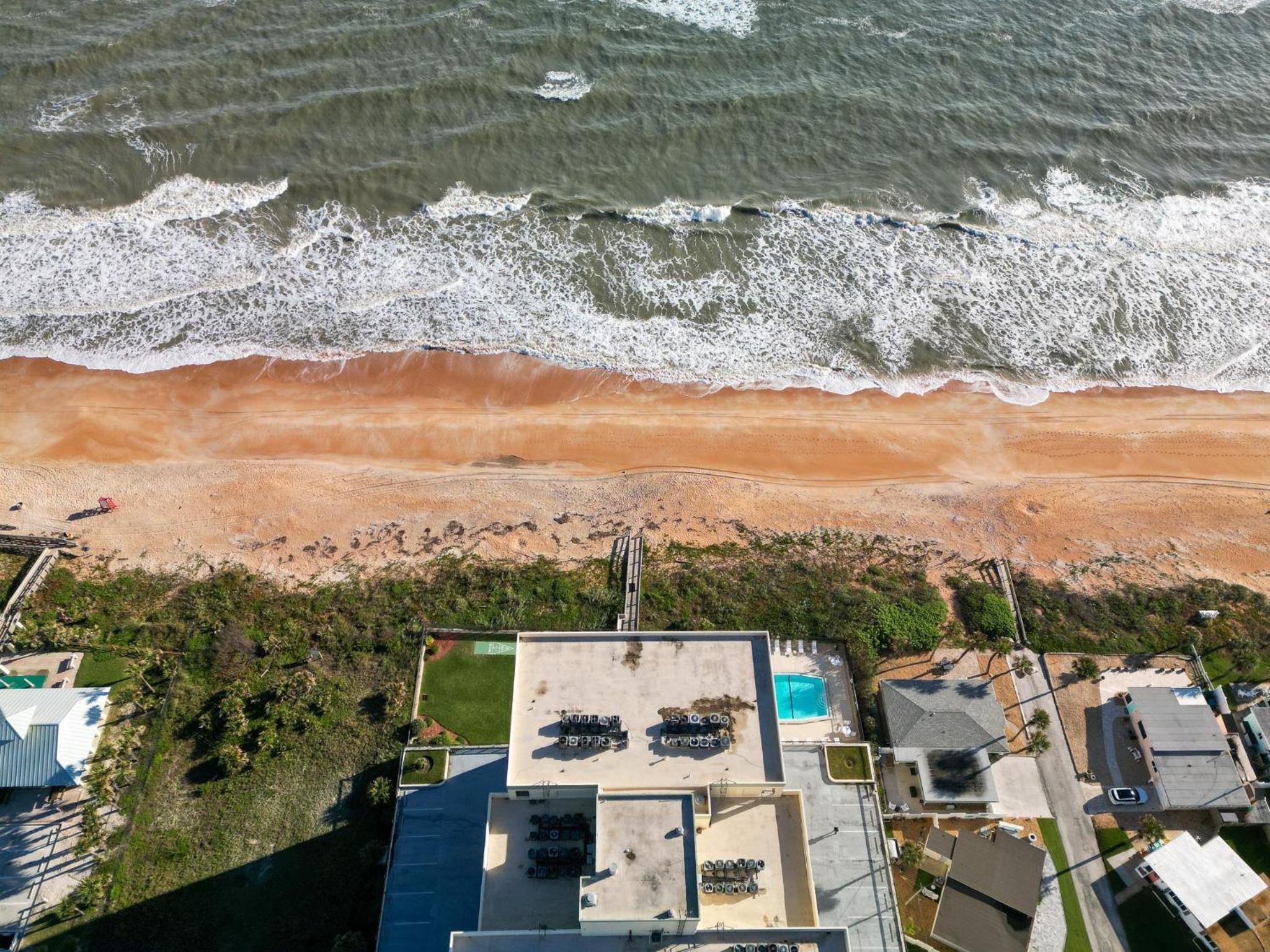 New Listing! Fully renovated with a sunset view, beachfront property with a heated pool