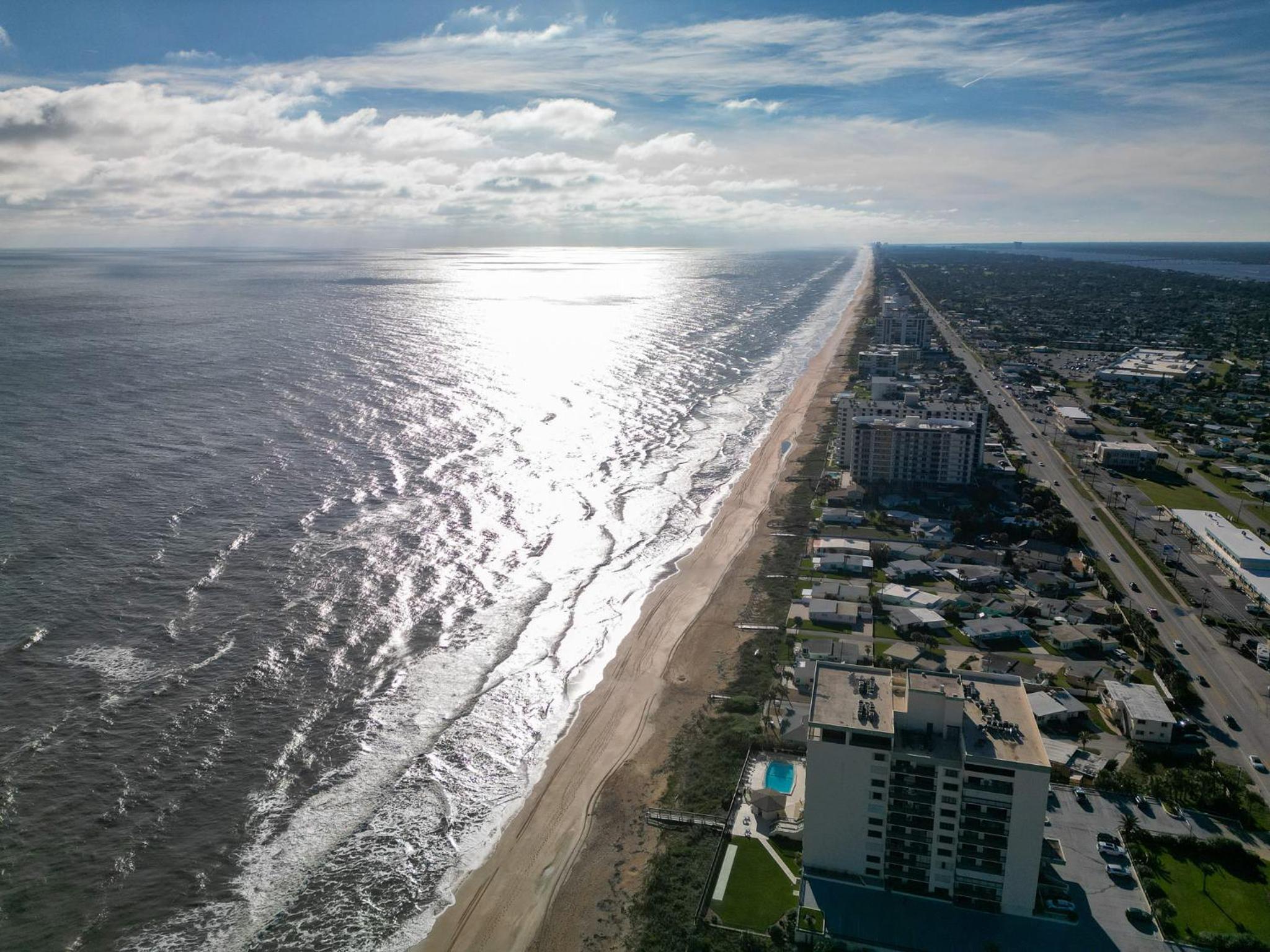 New Listing! Fully renovated with a sunset view, beachfront property with a heated pool