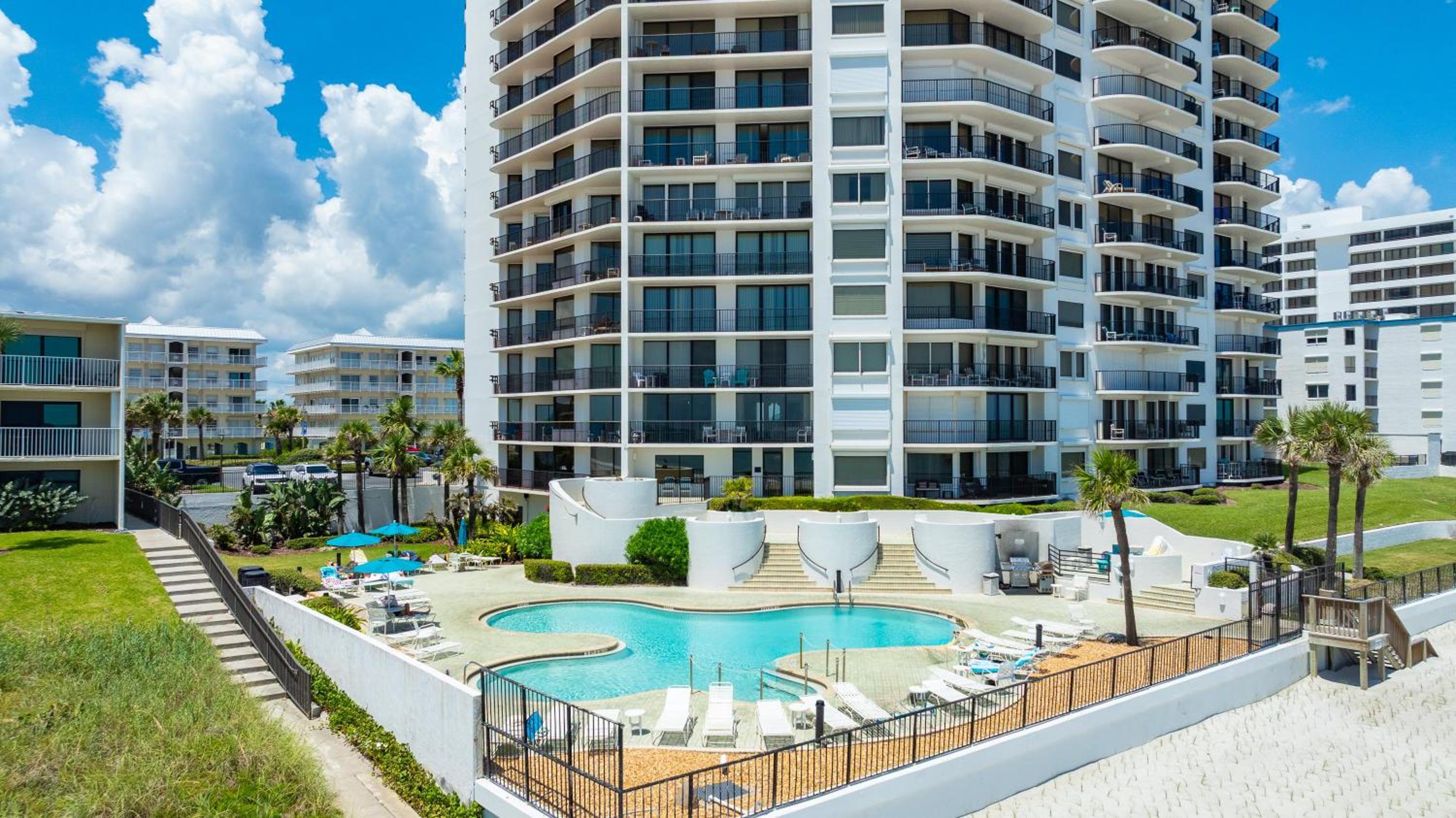 New Listing! Updated direct oceanfront condo with a pool, hot tub, and garage parking