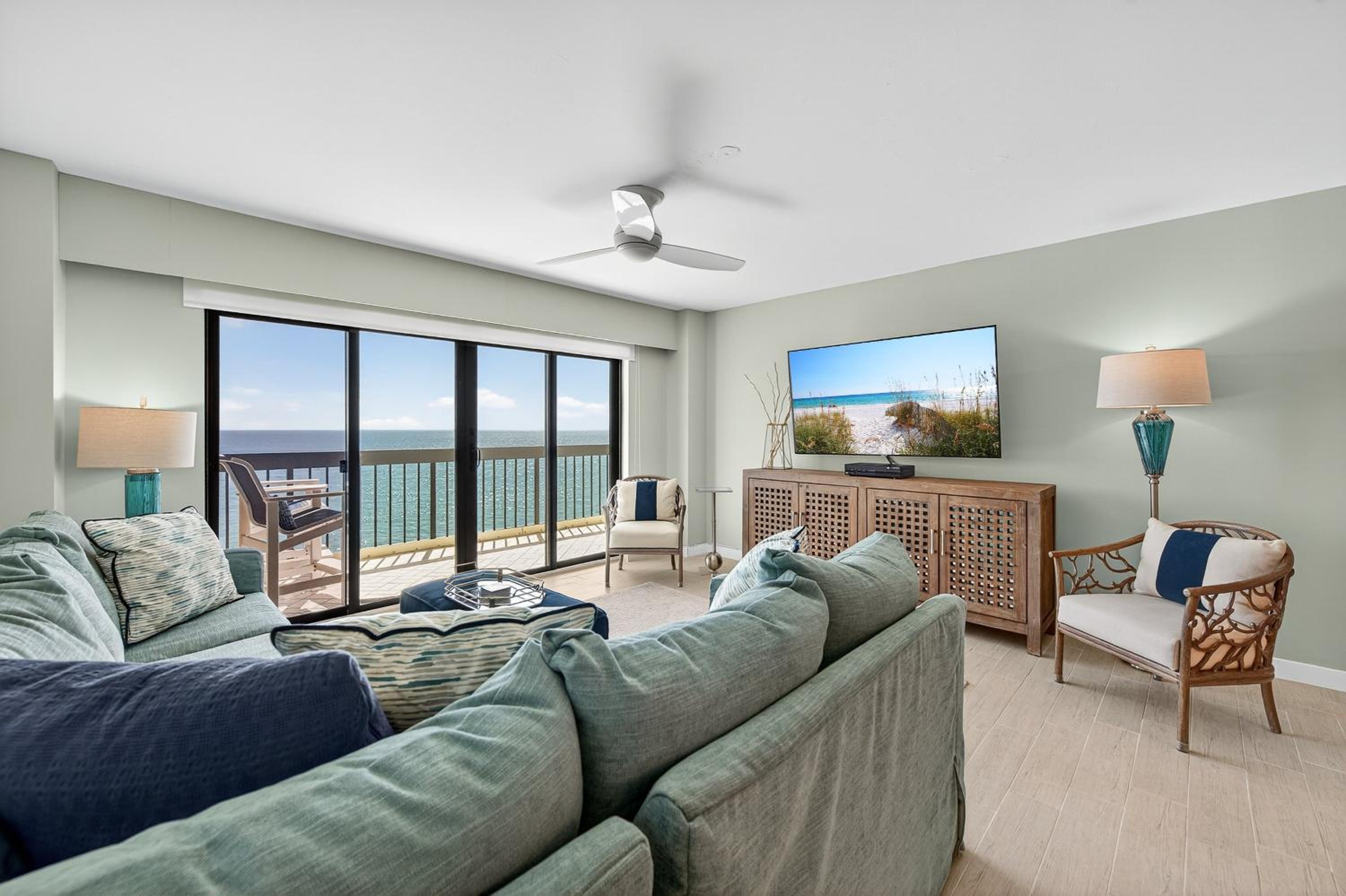 Renovated direct oceanfront condo with spacious balcony, heated pool, and garage parking