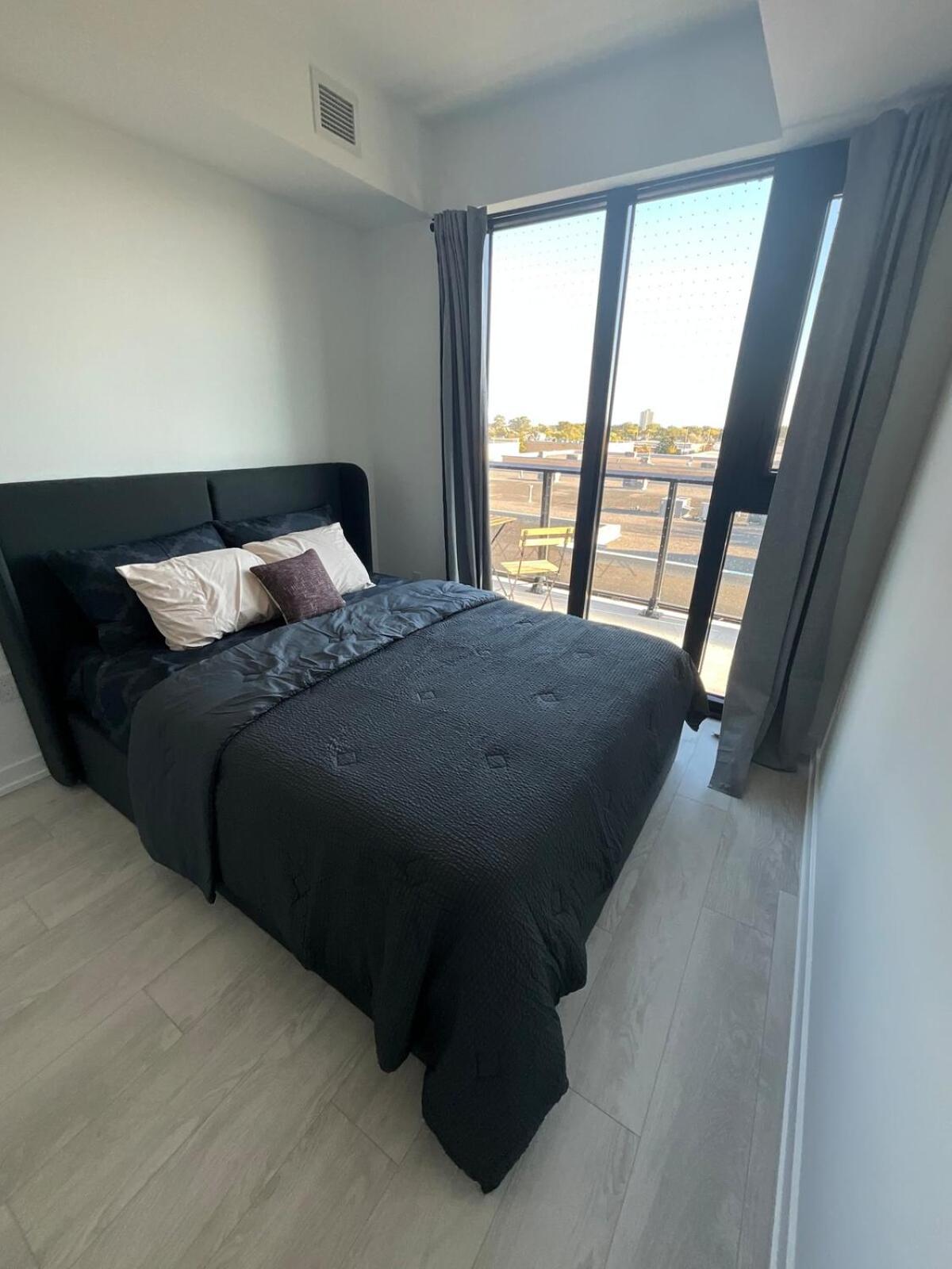 New Condo With Large Balcony - The Queensway Retreat