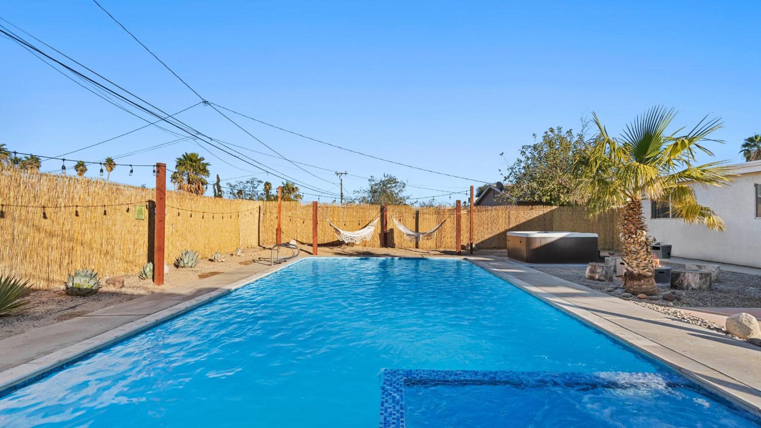 4BR Desert Home w Pool Hot Tub Firepit Game Room The Quiet Burn by AvantStay