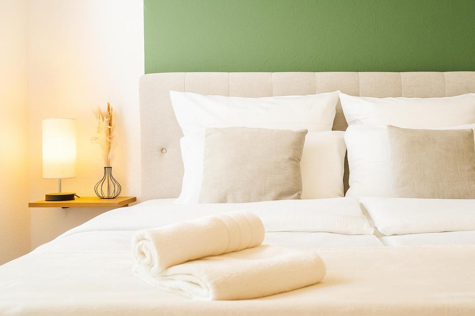 Wohlfühlapartment, Zentral, 200m zur UNI, Parkplatz, Boxspringbetten, Massagesessel, Nespresso, LAN & WIFI