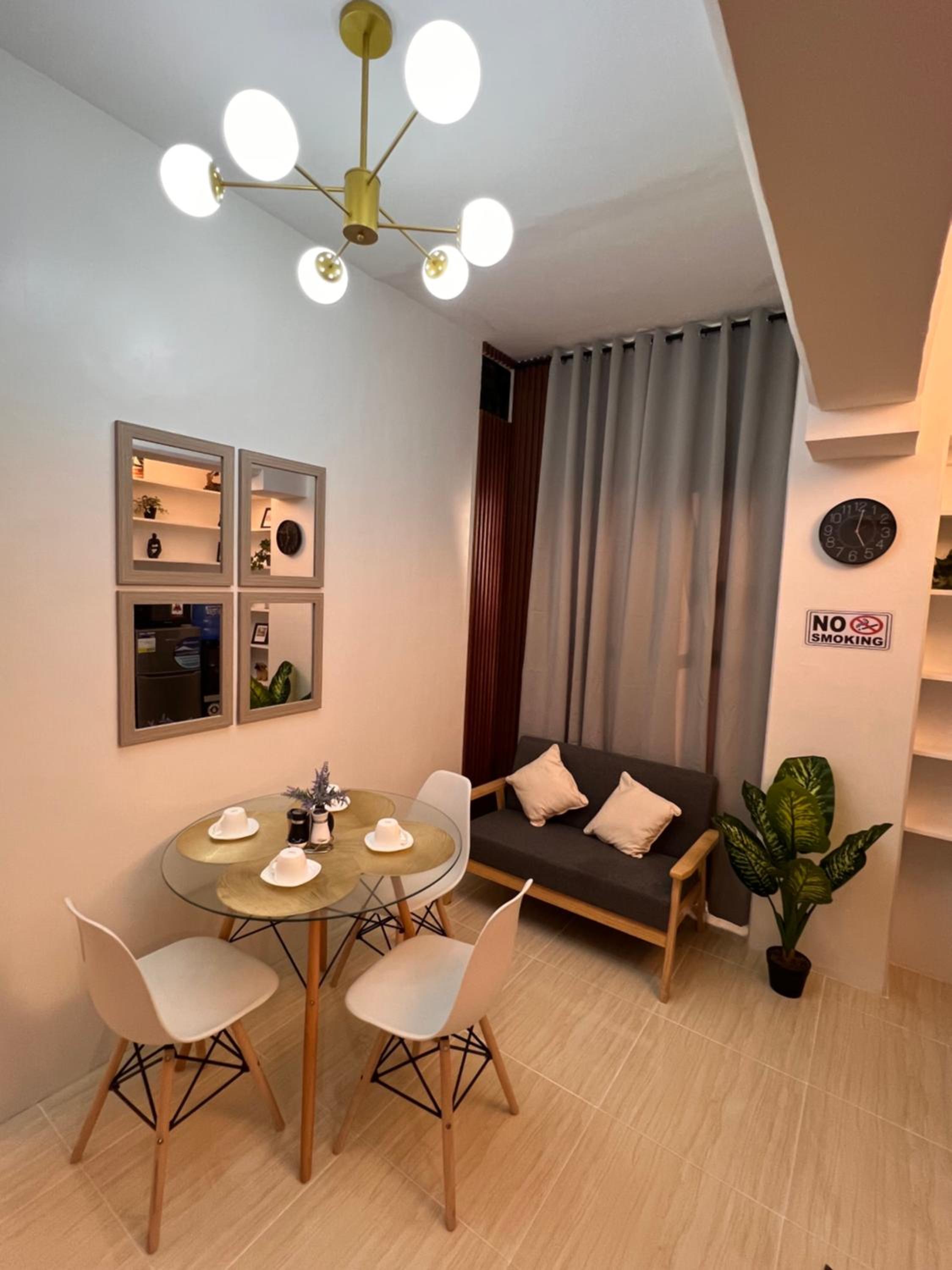 Seven-Eleven Inn 1BR Condo - Royal Oceancrest Mactan