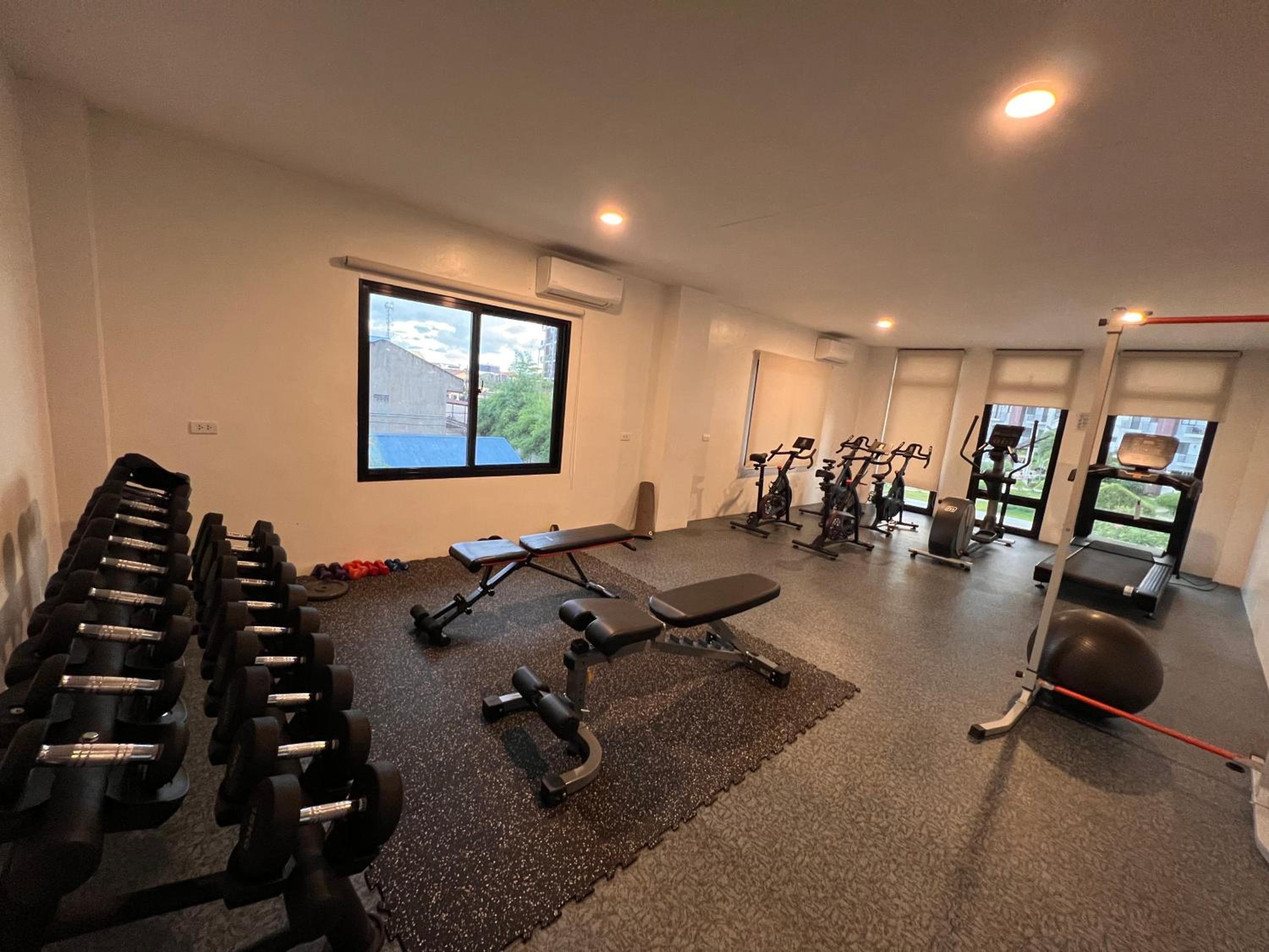 Seven-Eleven Inn 1BR Condo - Royal Oceancrest Mactan
