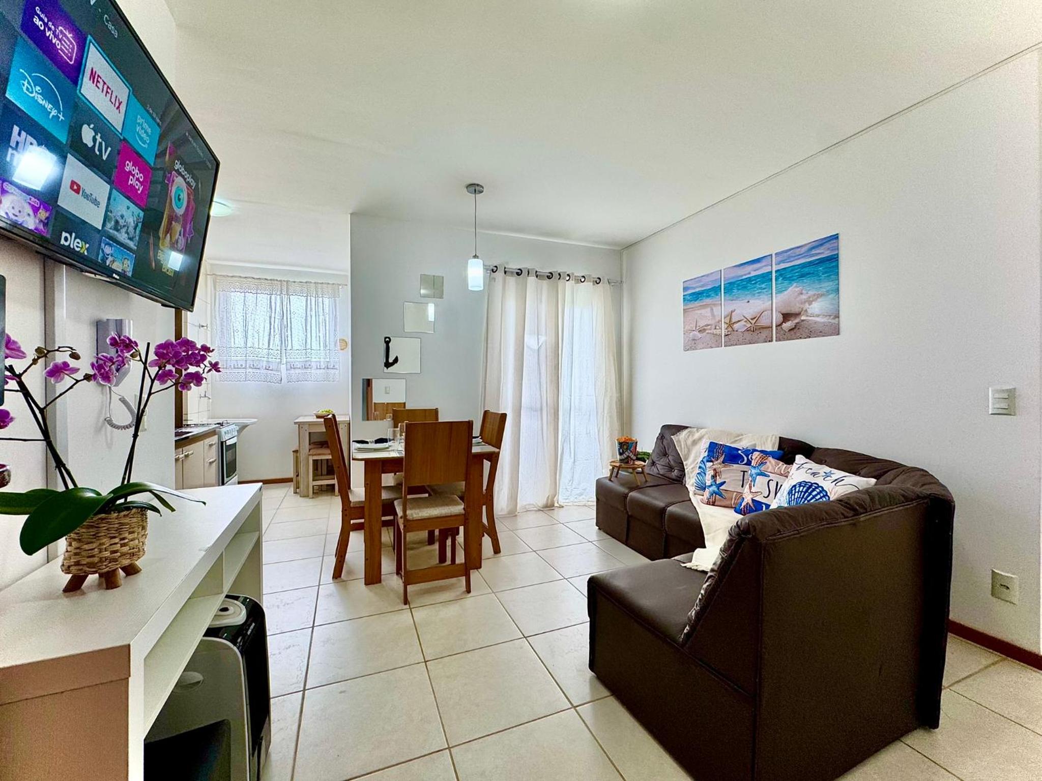 Apartamento a 400M PRAIA com PISCINA sacada com CHURRASQUEIRA privativa Wi-Fi Portaria 24h PLAYGROUND INFANTIL vaga privativa de GARAGEM Reserve agora mesm