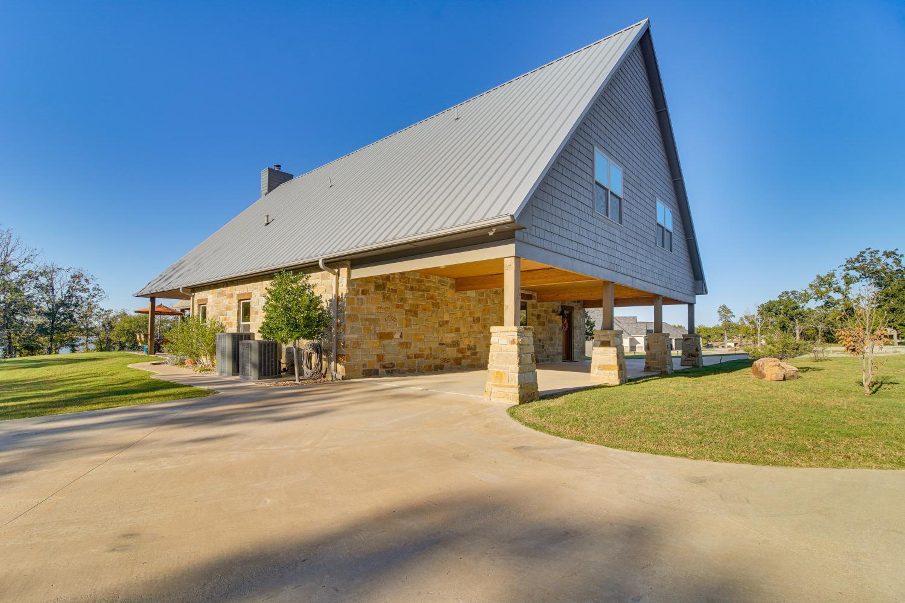Upscale A-Frame Escape with Lake Access in Quinton!