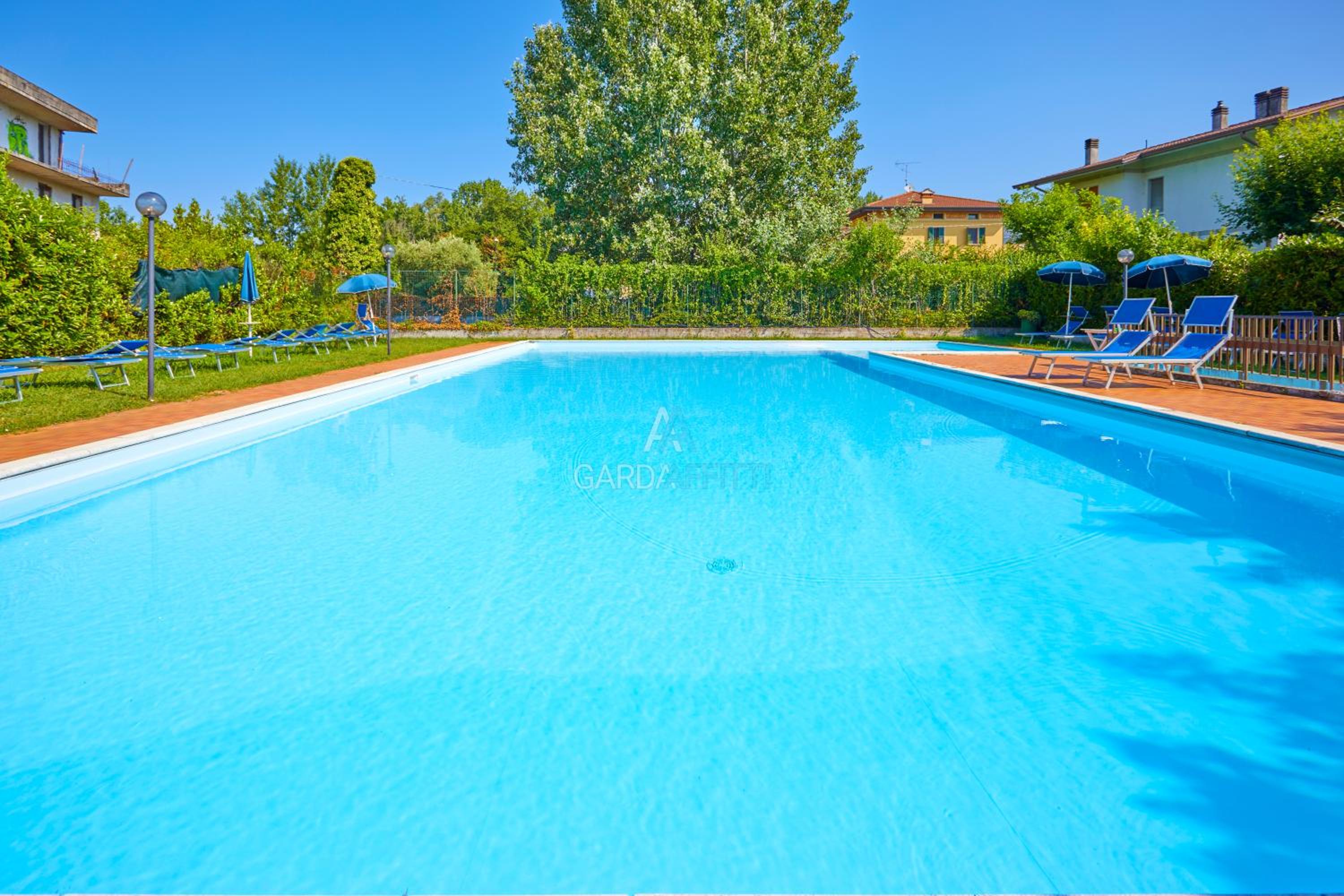 Sunshine Apt - Solarium Vista Lago a 350m dal Lago con Piscina