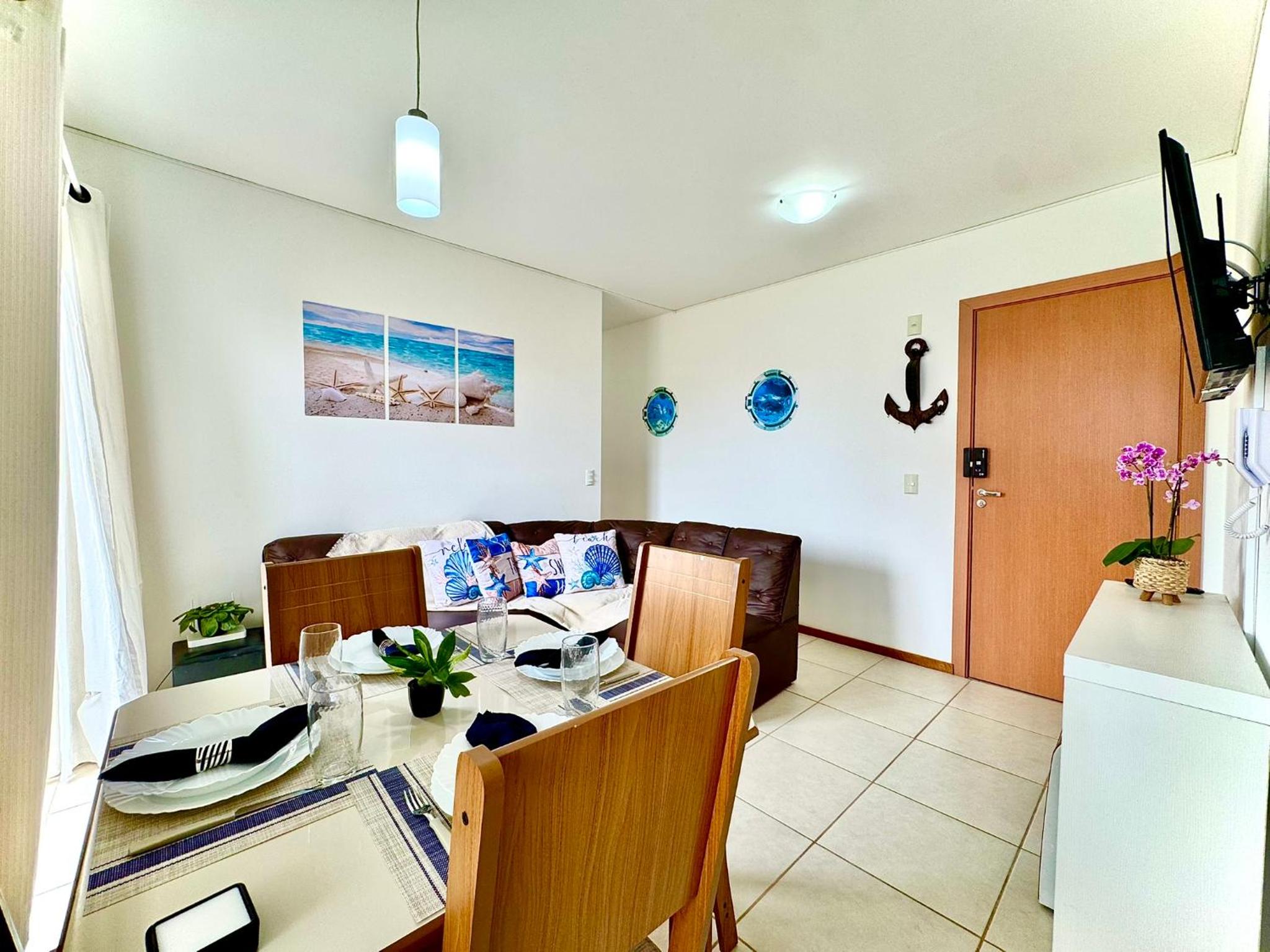 Apartamento a 400M PRAIA com PISCINA sacada com CHURRASQUEIRA privativa Wi-Fi Portaria 24h PLAYGROUND INFANTIL vaga privativa de GARAGEM Reserve agora mesm