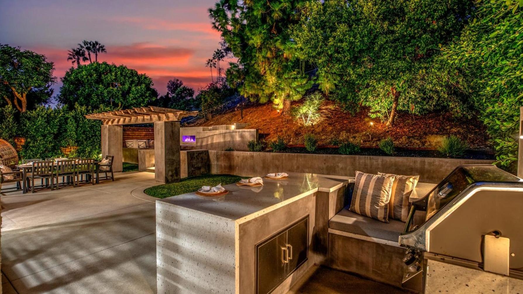 Spanish-Inspired Mission Viejo Home with Courtyard Firepit Backyard Dining Casa Cordero by AvantStay
