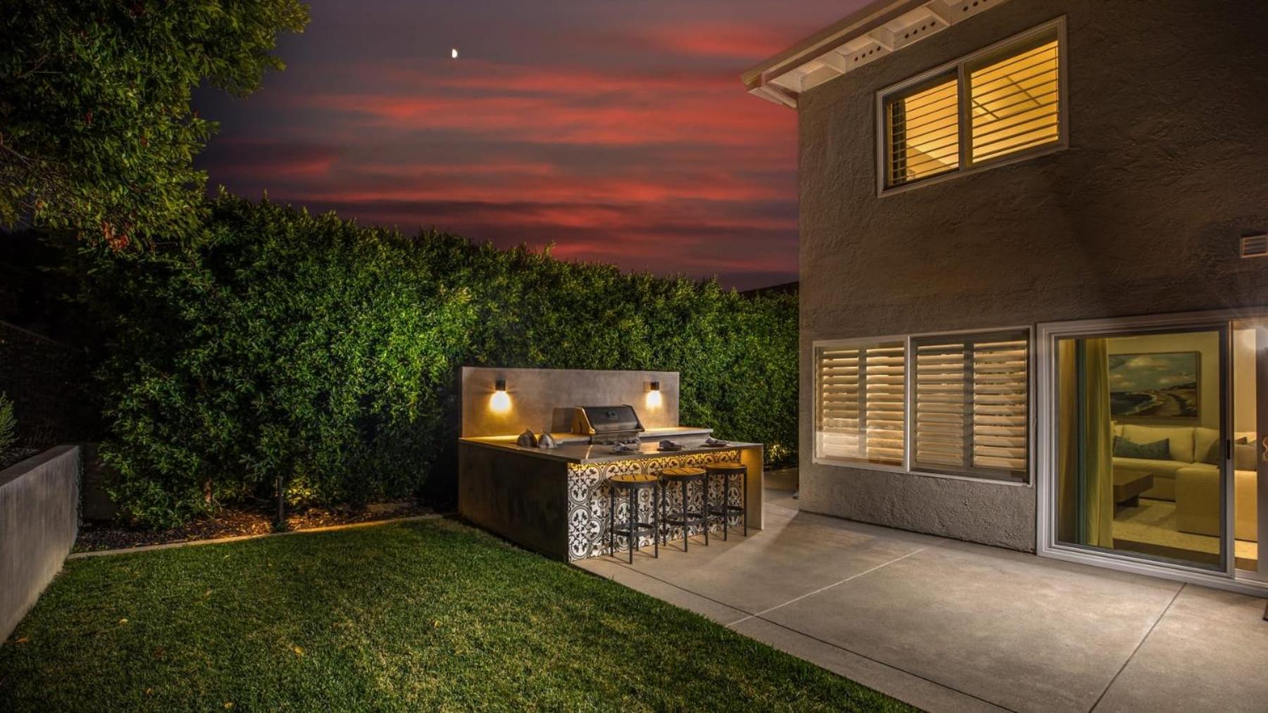 Spanish-Inspired Mission Viejo Home with Courtyard Firepit Backyard Dining Casa Cordero by AvantStay