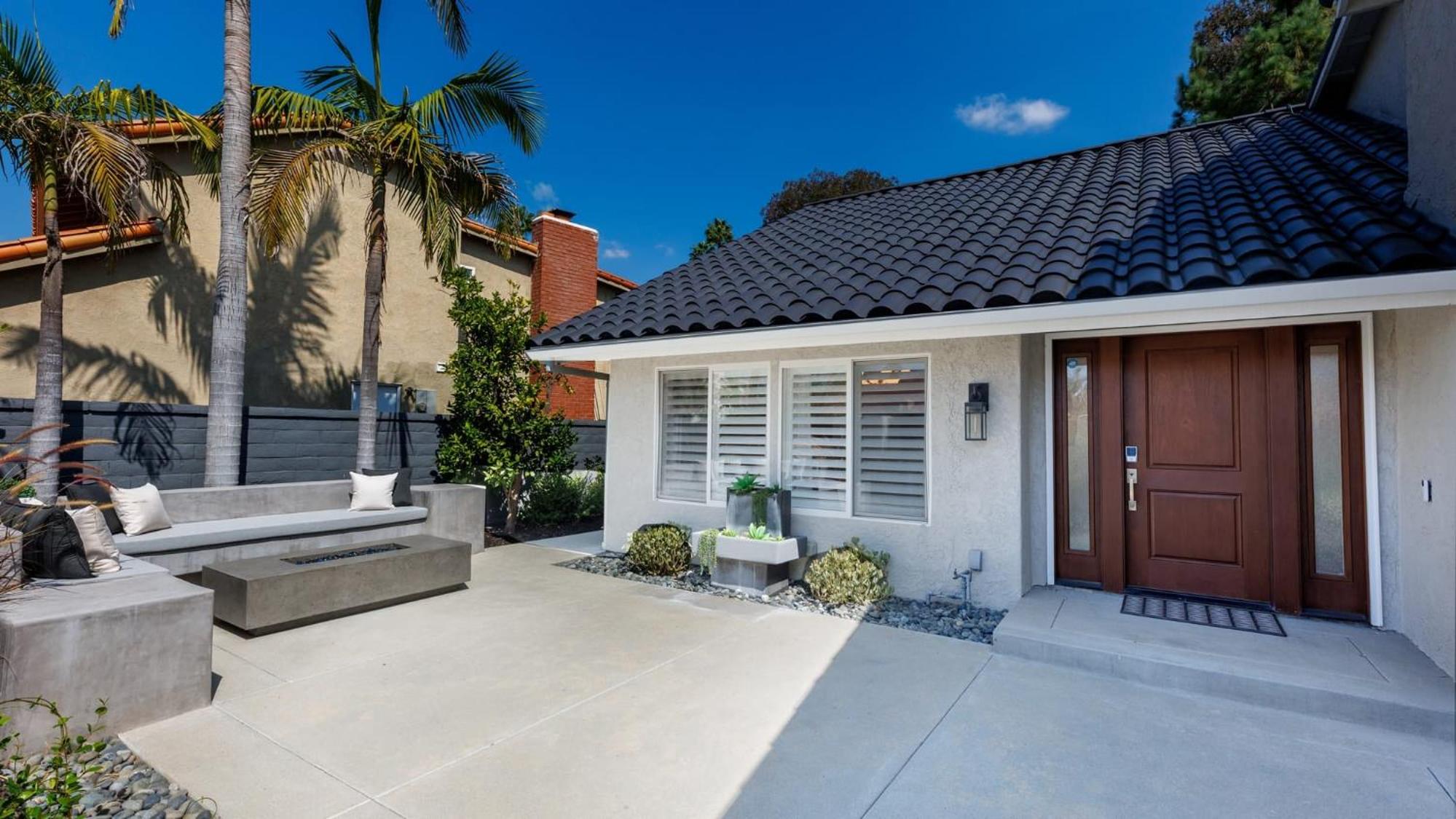 Spanish-Inspired Mission Viejo Home with Courtyard Firepit Backyard Dining Casa Cordero by AvantStay