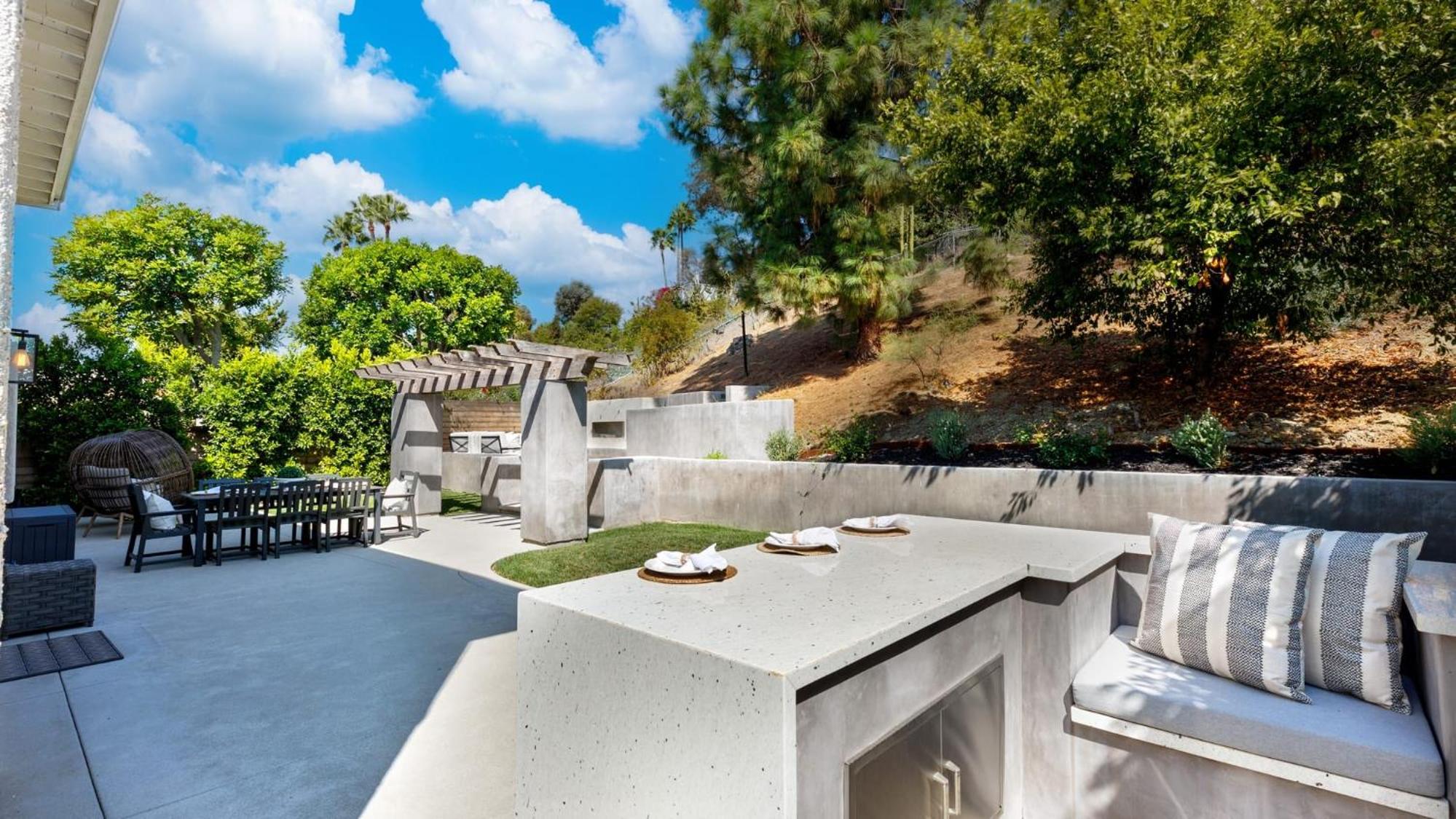 Spanish-Inspired Mission Viejo Home with Courtyard Firepit Backyard Dining Casa Cordero by AvantStay
