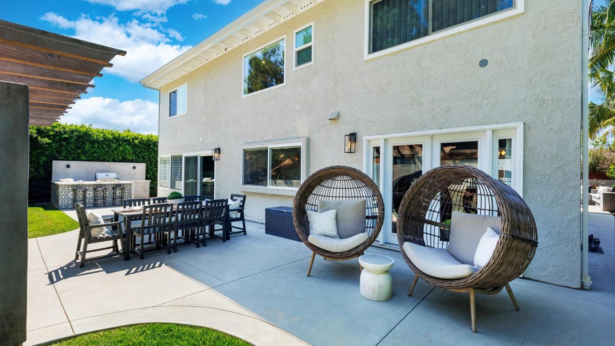 Spanish-Inspired Mission Viejo Home with Courtyard Firepit Backyard Dining Casa Cordero by AvantStay