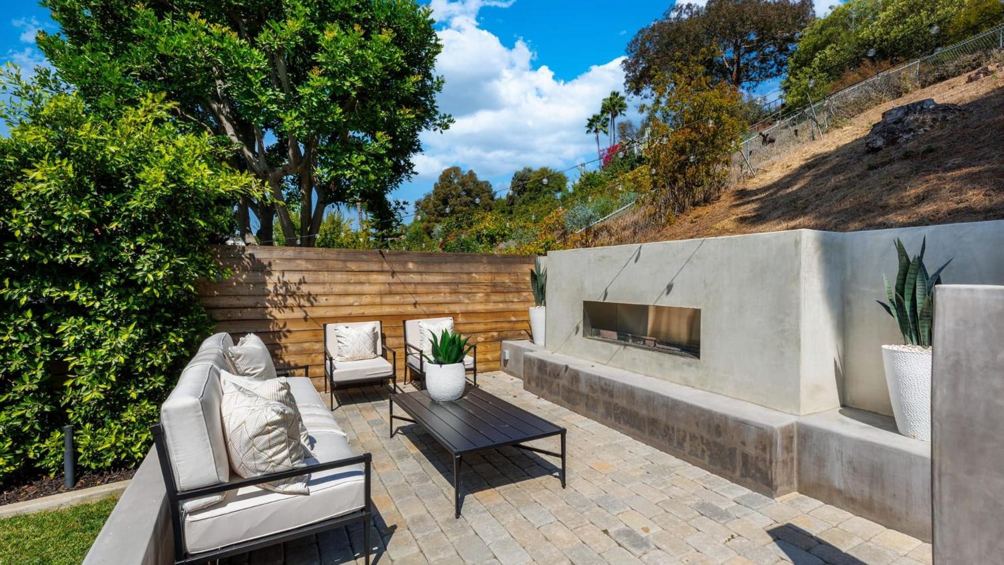 Spanish-Inspired Mission Viejo Home with Courtyard Firepit Backyard Dining Casa Cordero by AvantStay